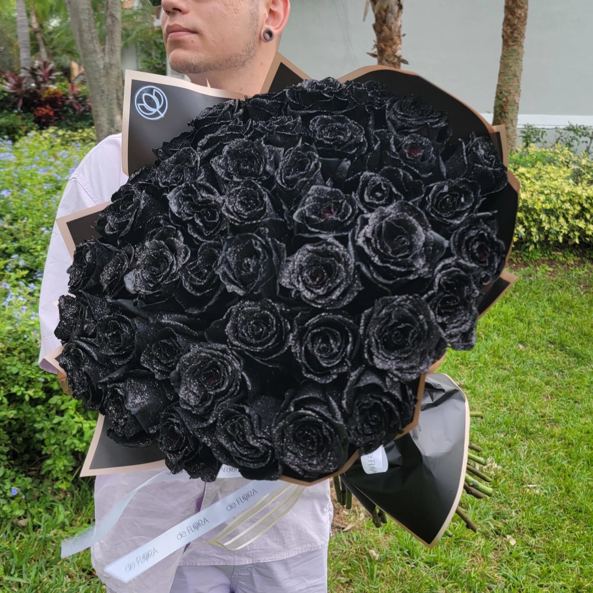 Large bouquet of black roses wrapped in black paper, photo 2 of 5