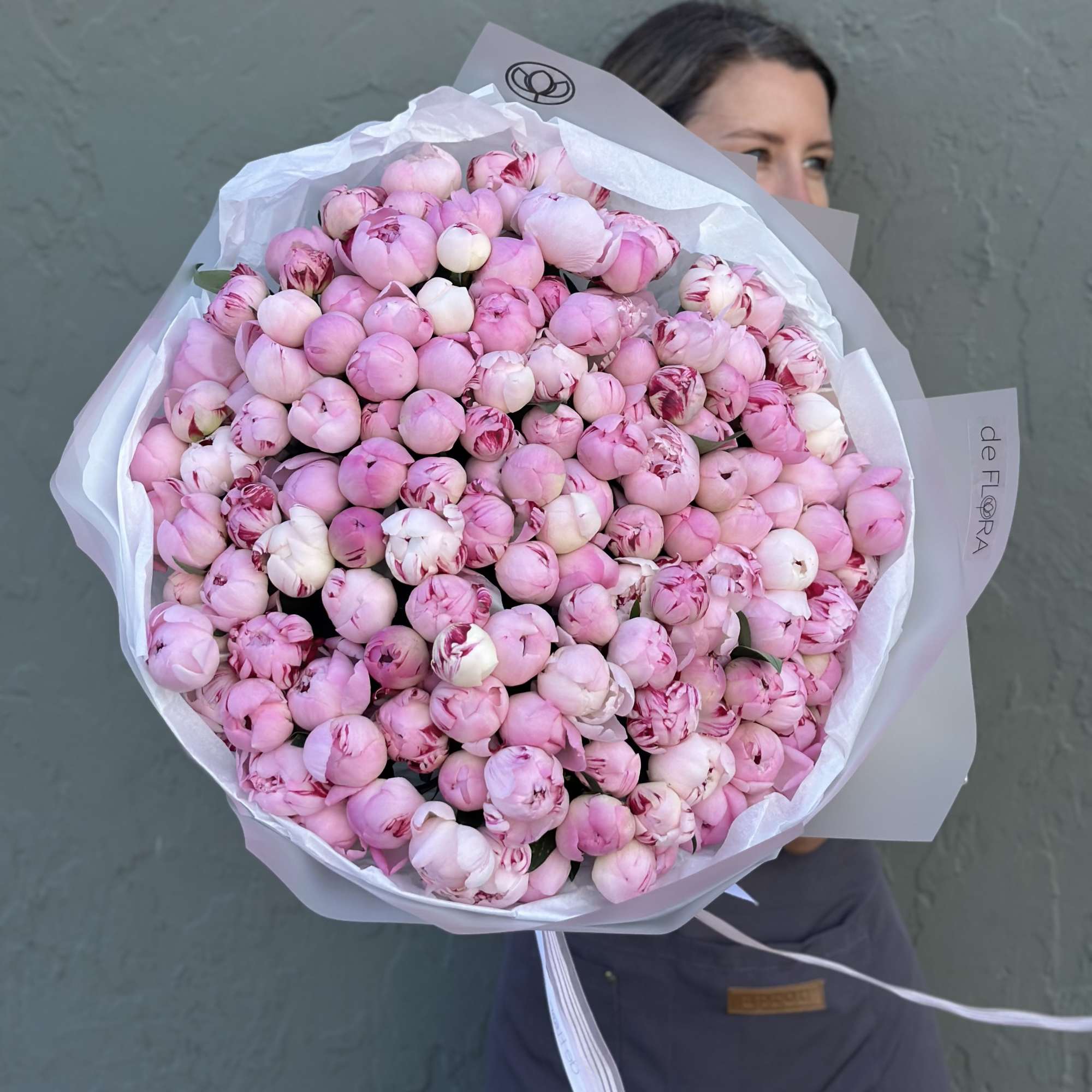 Large bouquet of pink peonies wrapped in white paper, photo 4 of 5