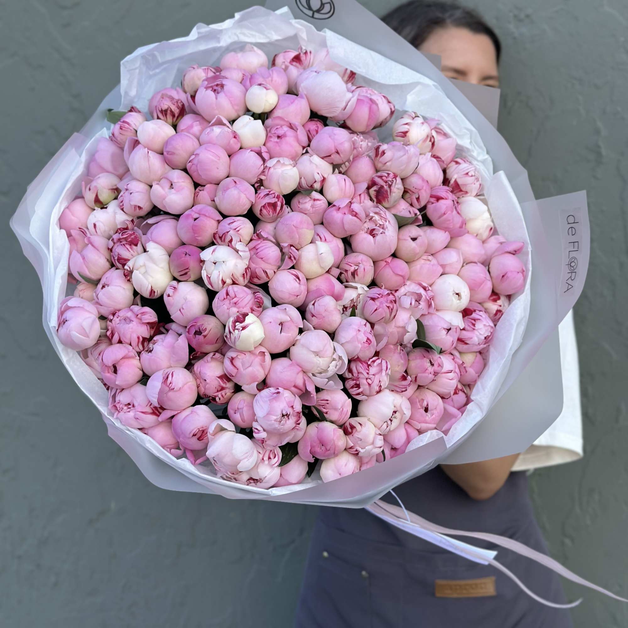 Large bouquet of pink peonies wrapped in white paper, photo 5 of 5