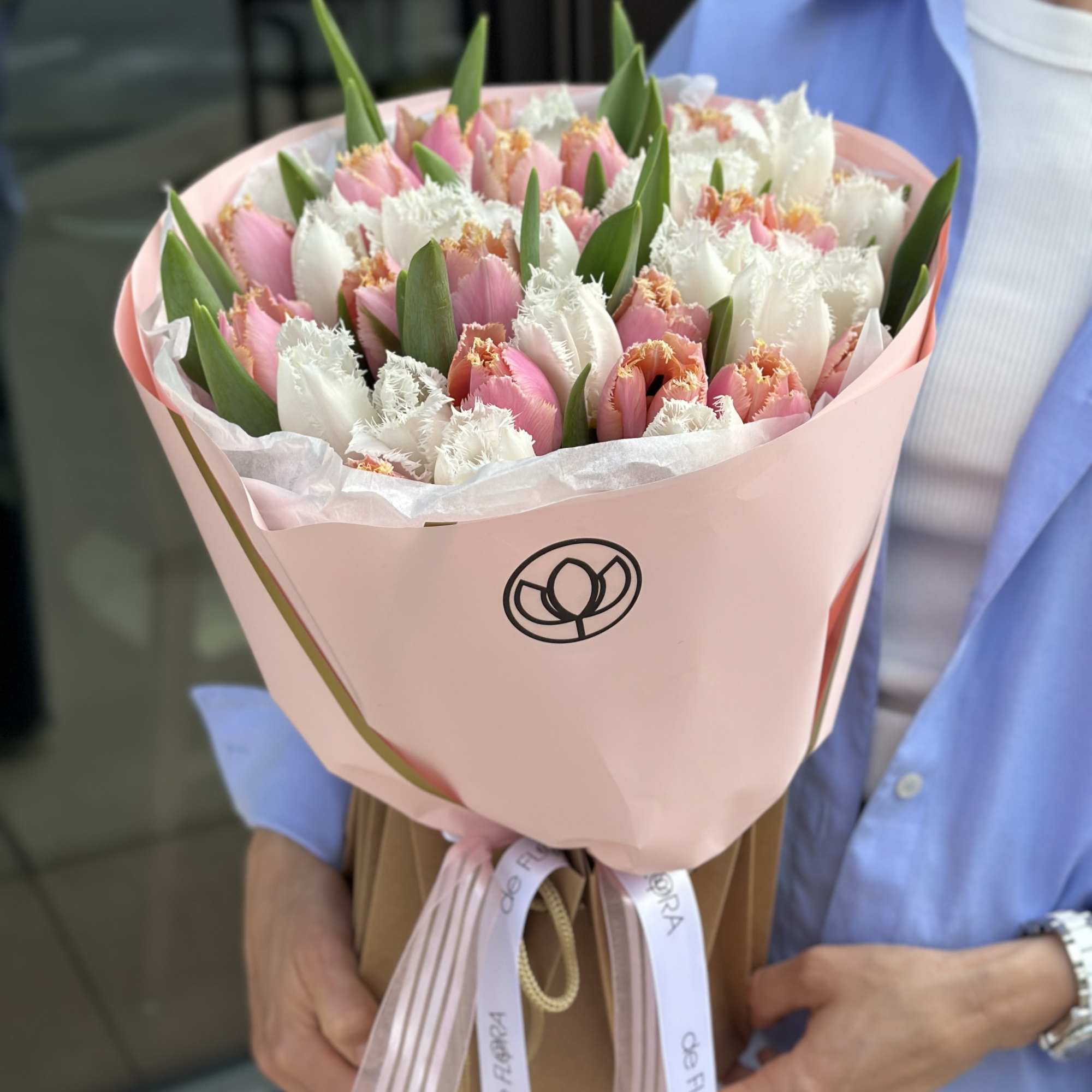 Pink and white tulip bouquet wrapped in pastel paper, photo 5 of 5