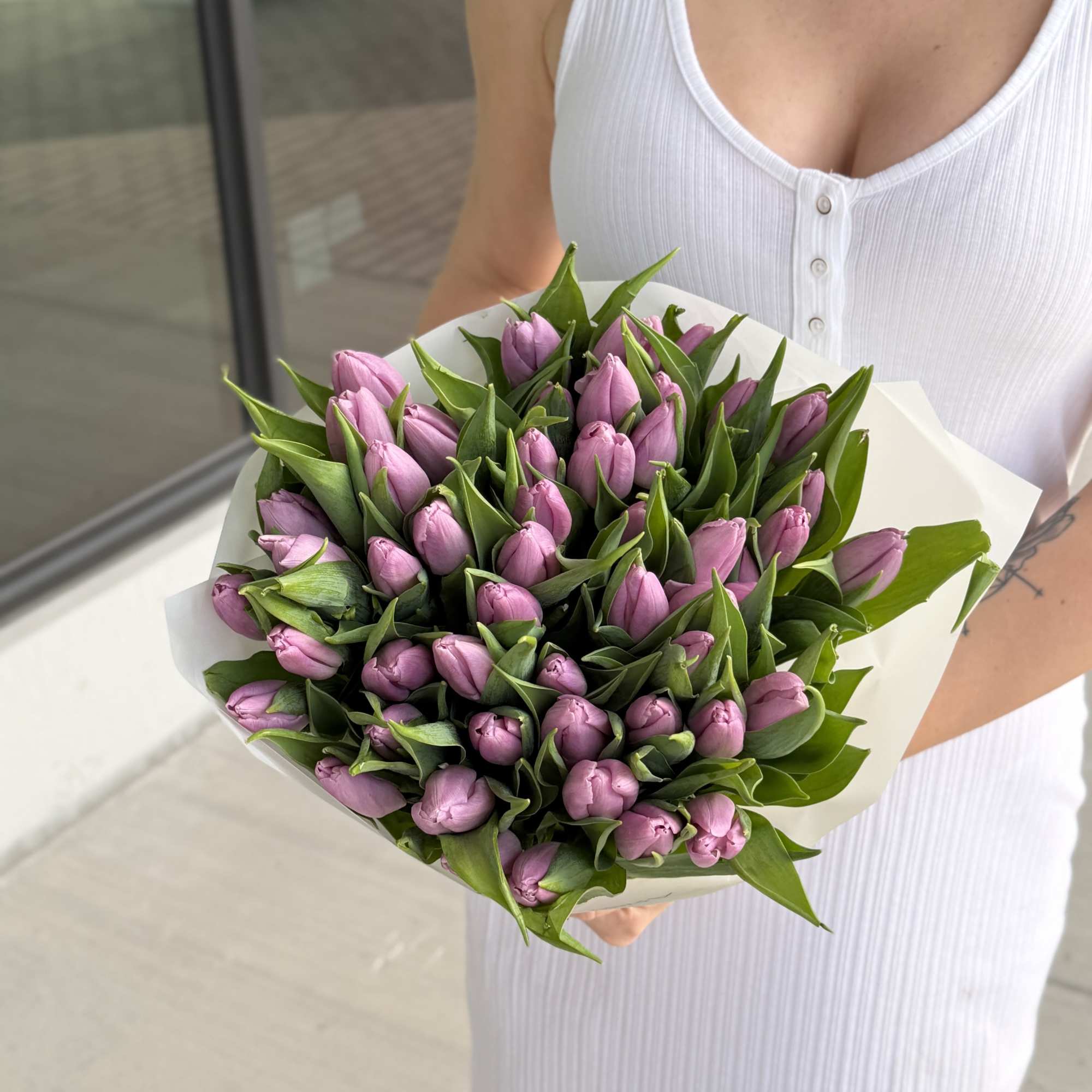 Bouquet of pink tulips wrapped in white paper, photo 2 of 3