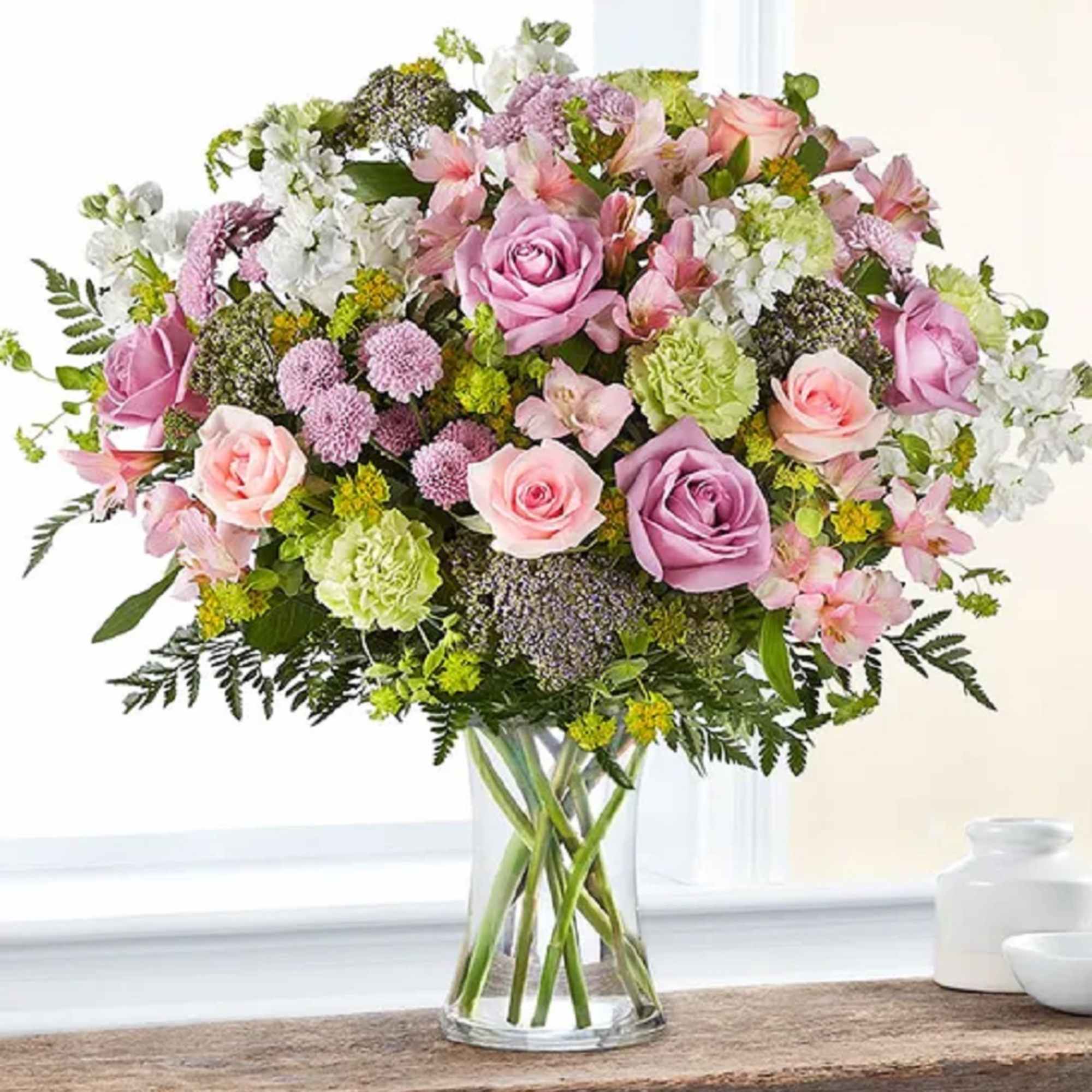 Mixed pink and white flower bouquet in a clear glass vase, photo 6 of 6