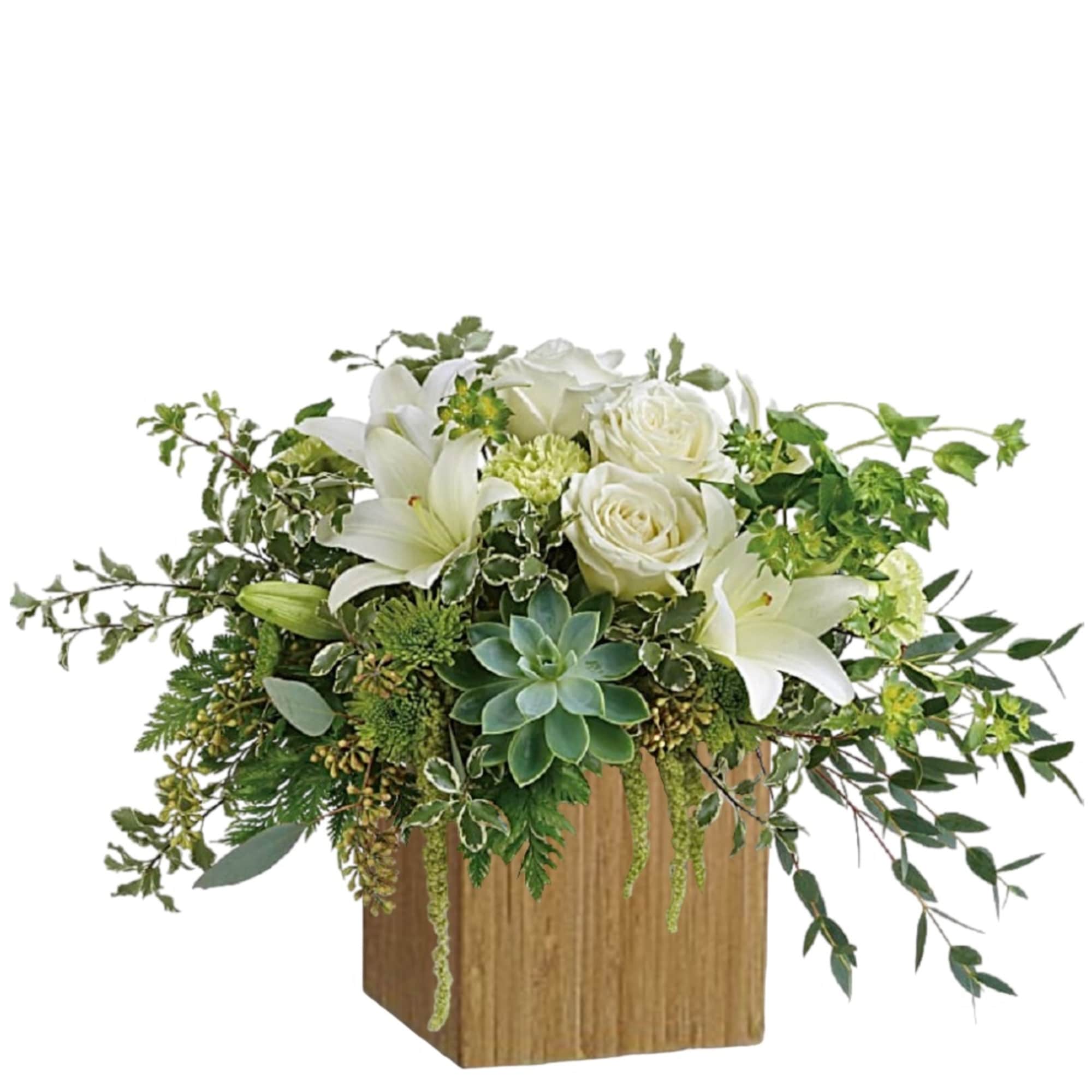 White roses and lilies in a wooden cube vase with trailing greenery, photo 2 of 6