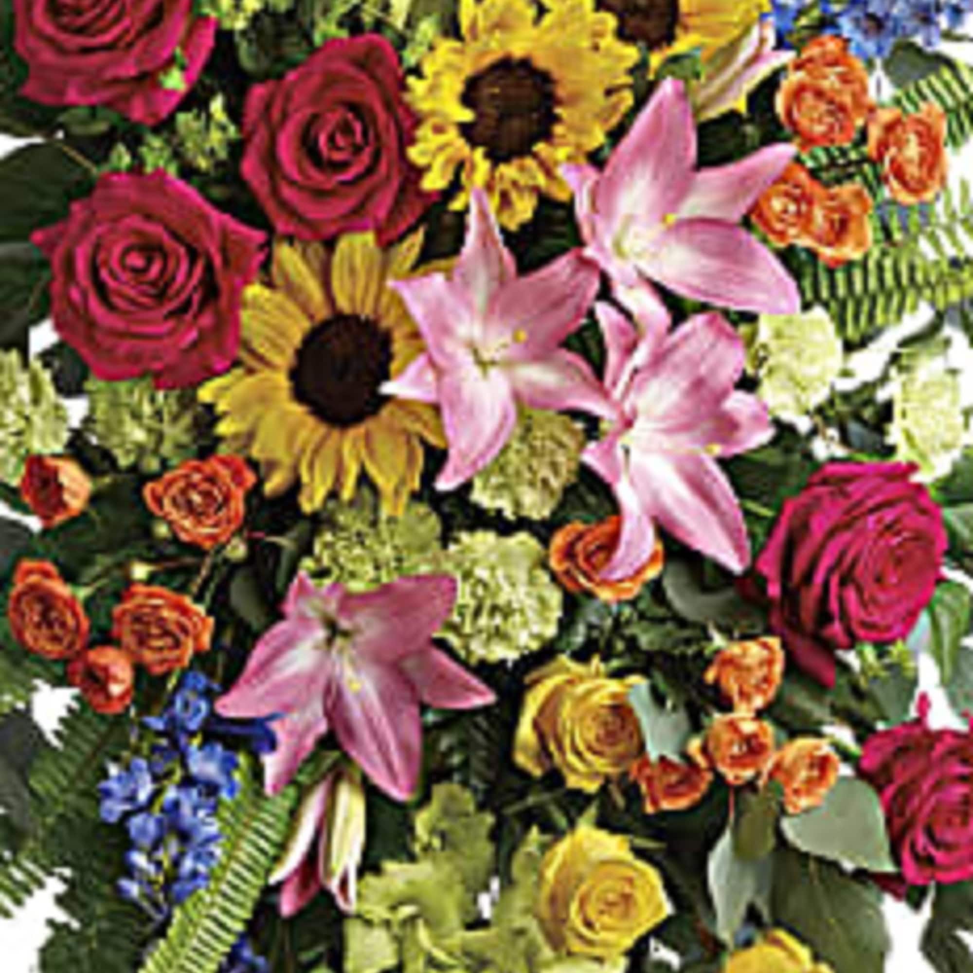 Tall mixed bouquet with roses, lilies, sunflowers, and blue flowers