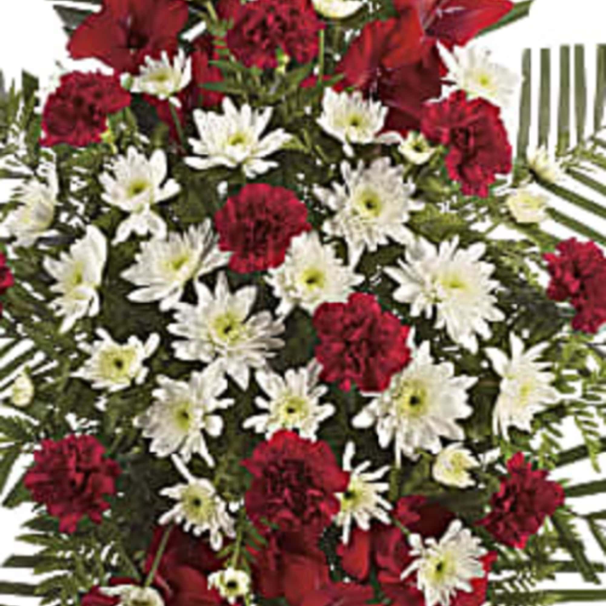 Red and white floral standing spray with palm fronds