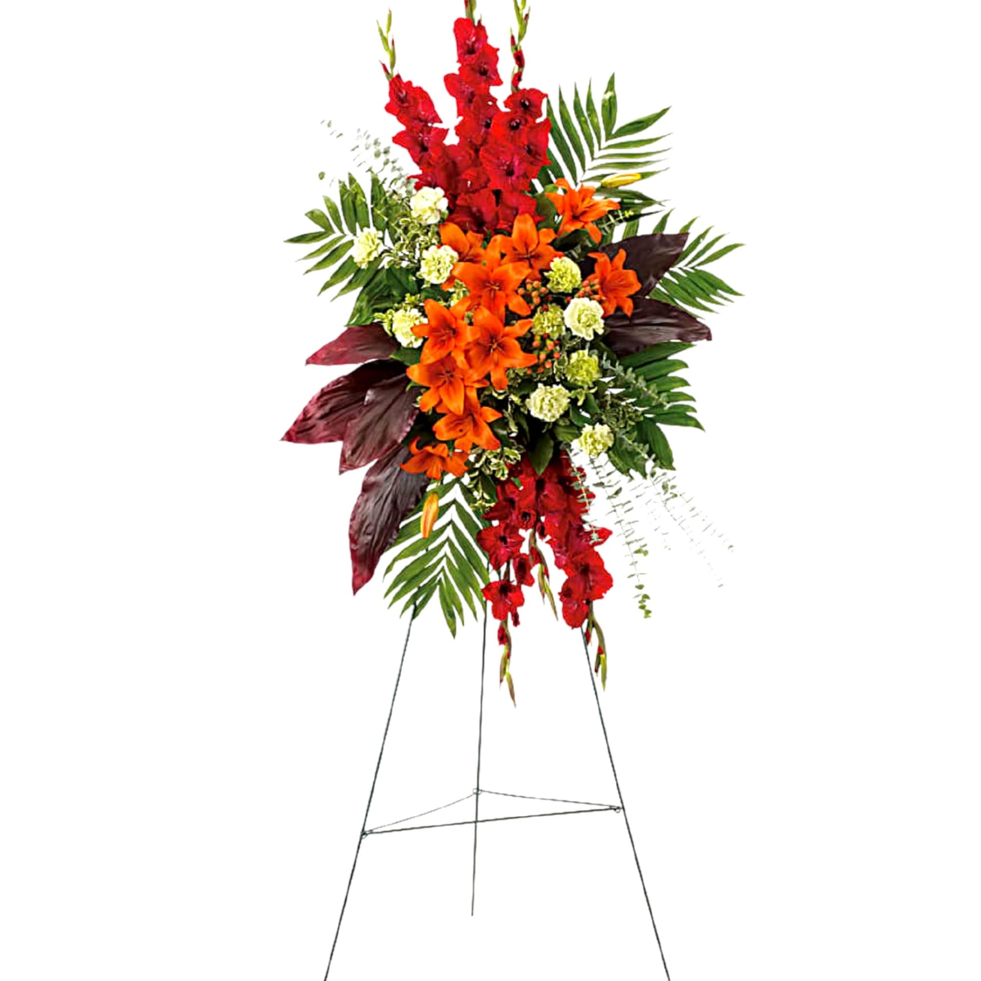 Tall standing floral spray with red and orange flowers on an easel