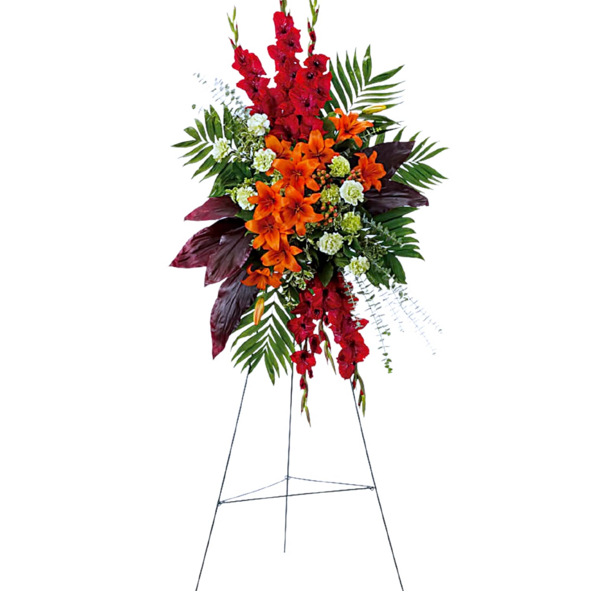 Standing floral spray with red and orange flowers on an easel
