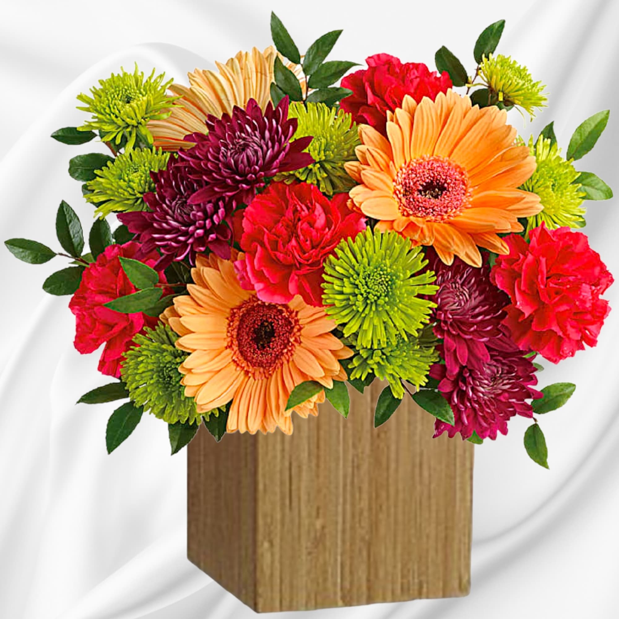 Mixed bouquet of gerbera daisies and chrysanthemums in a wooden cube vase, photo 2 of 4