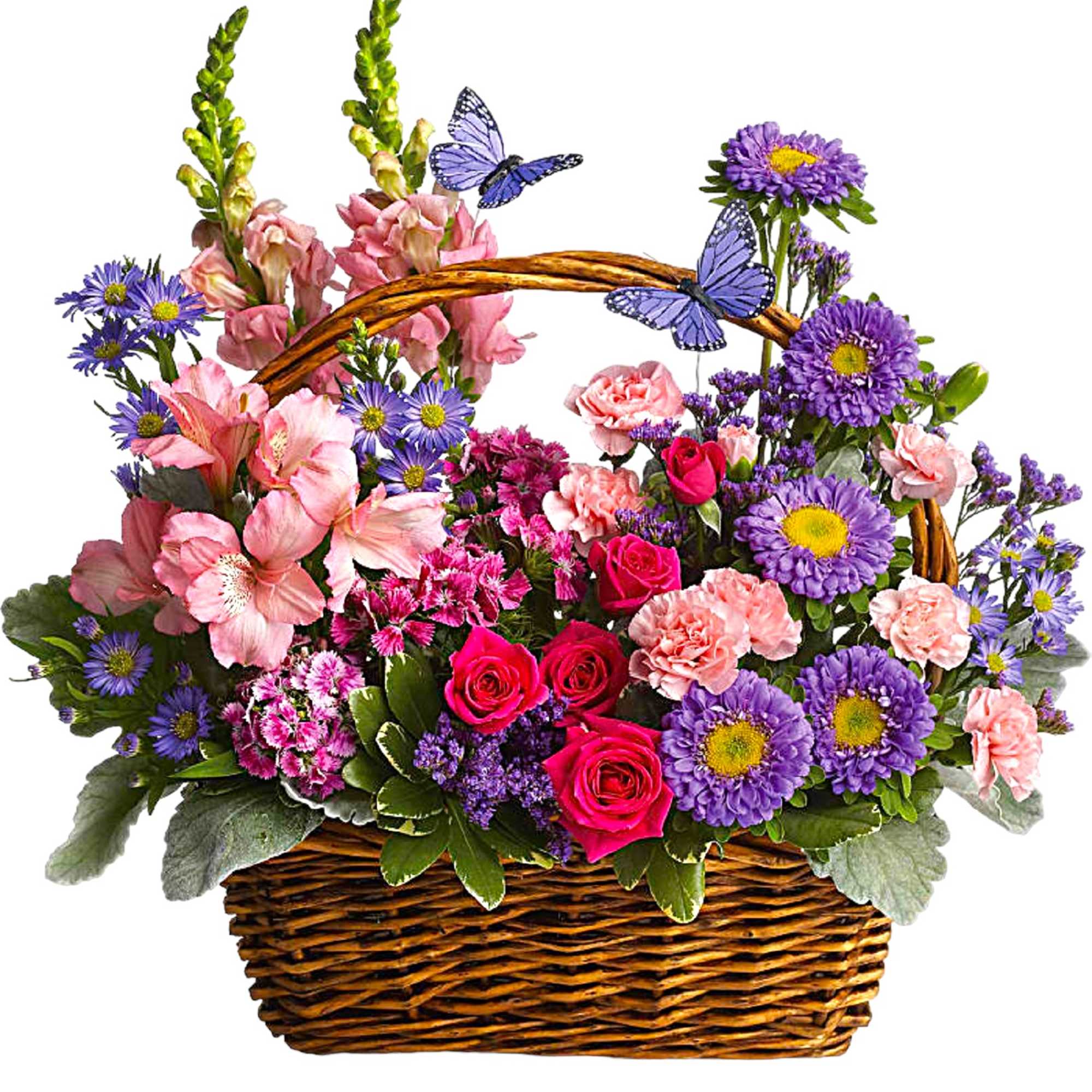Mixed pink and purple flowers in a wicker basket with butterfly picks