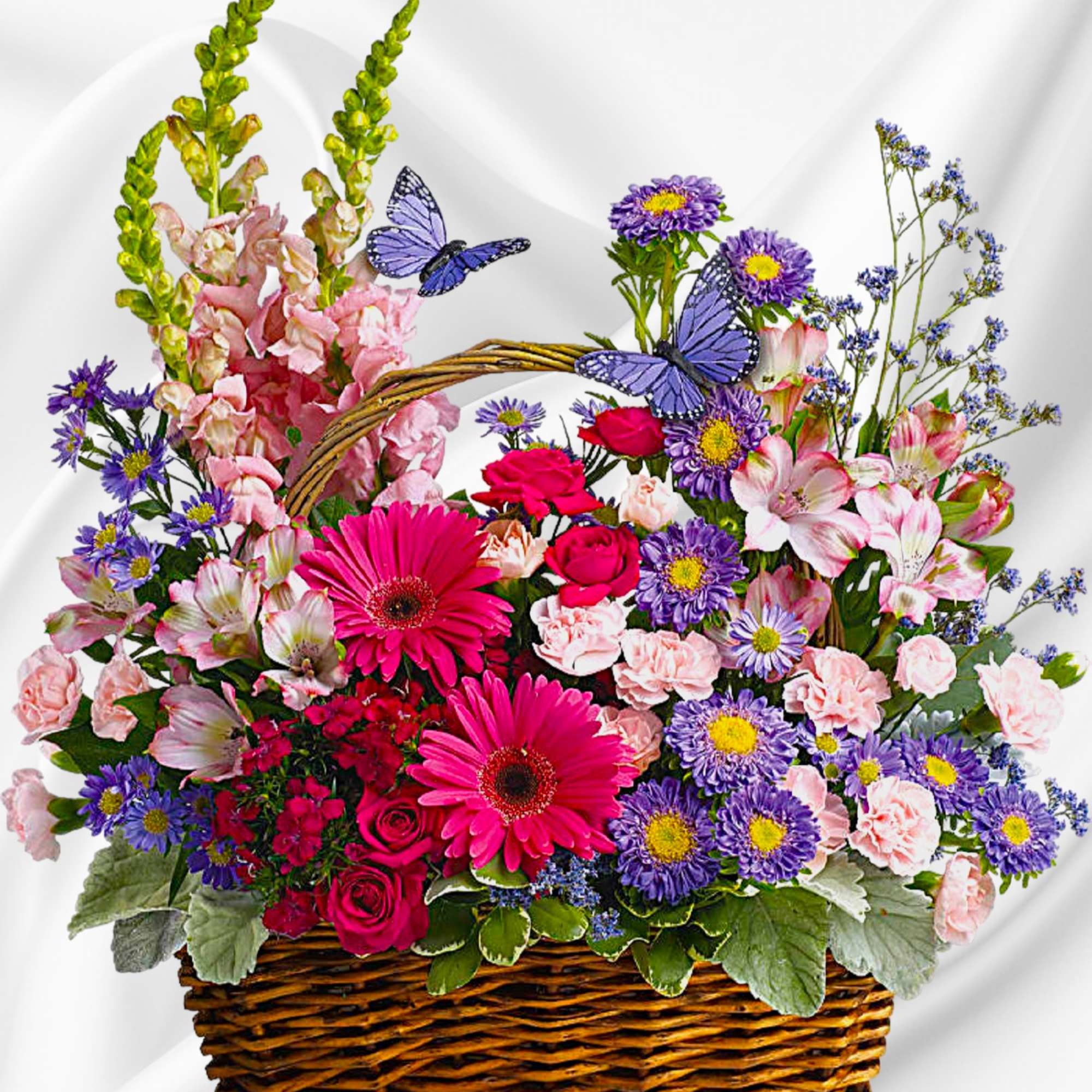 Mixed flower basket with pink, purple, and red blooms