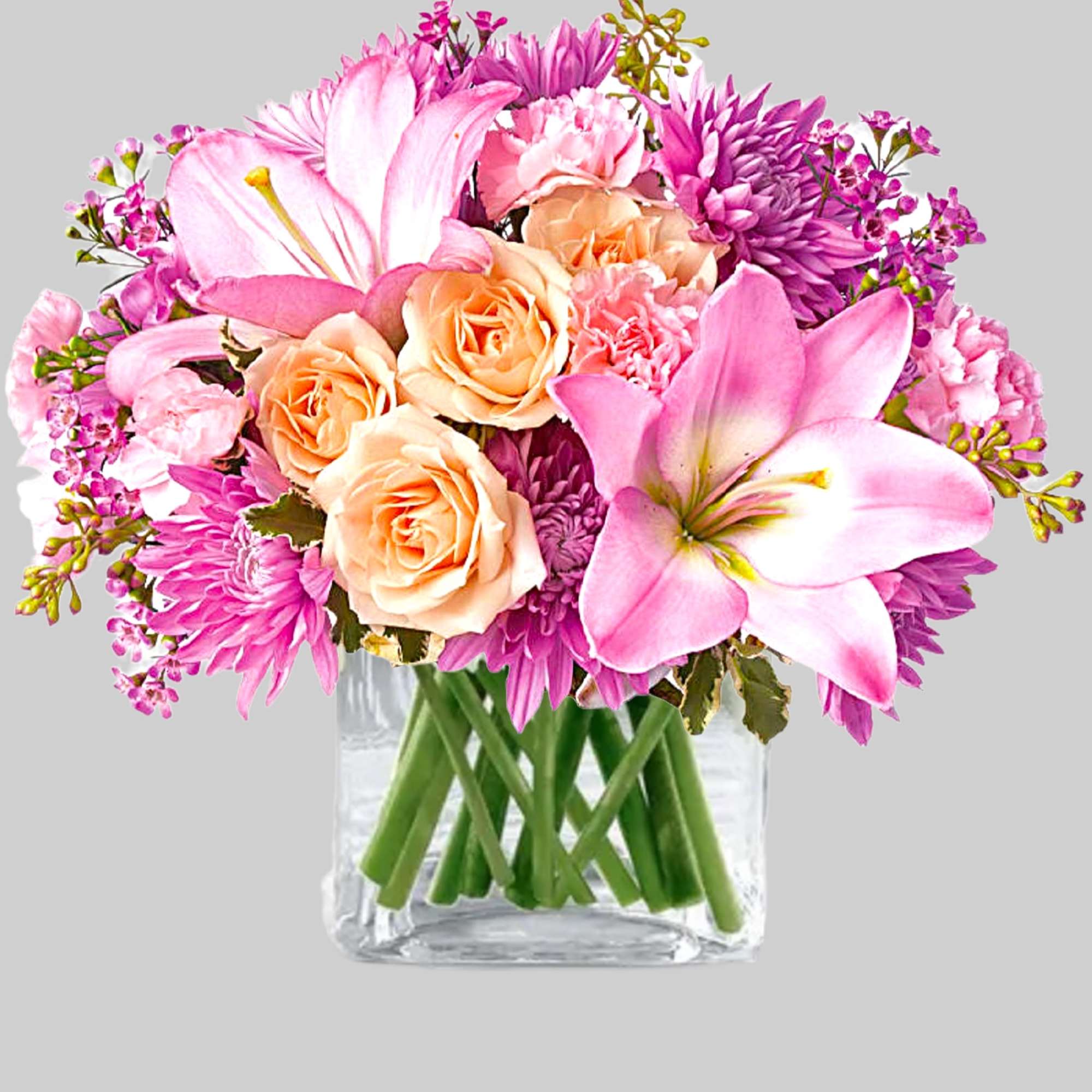 Pink and peach mixed bouquet in a clear glass vase, photo 5 of 5