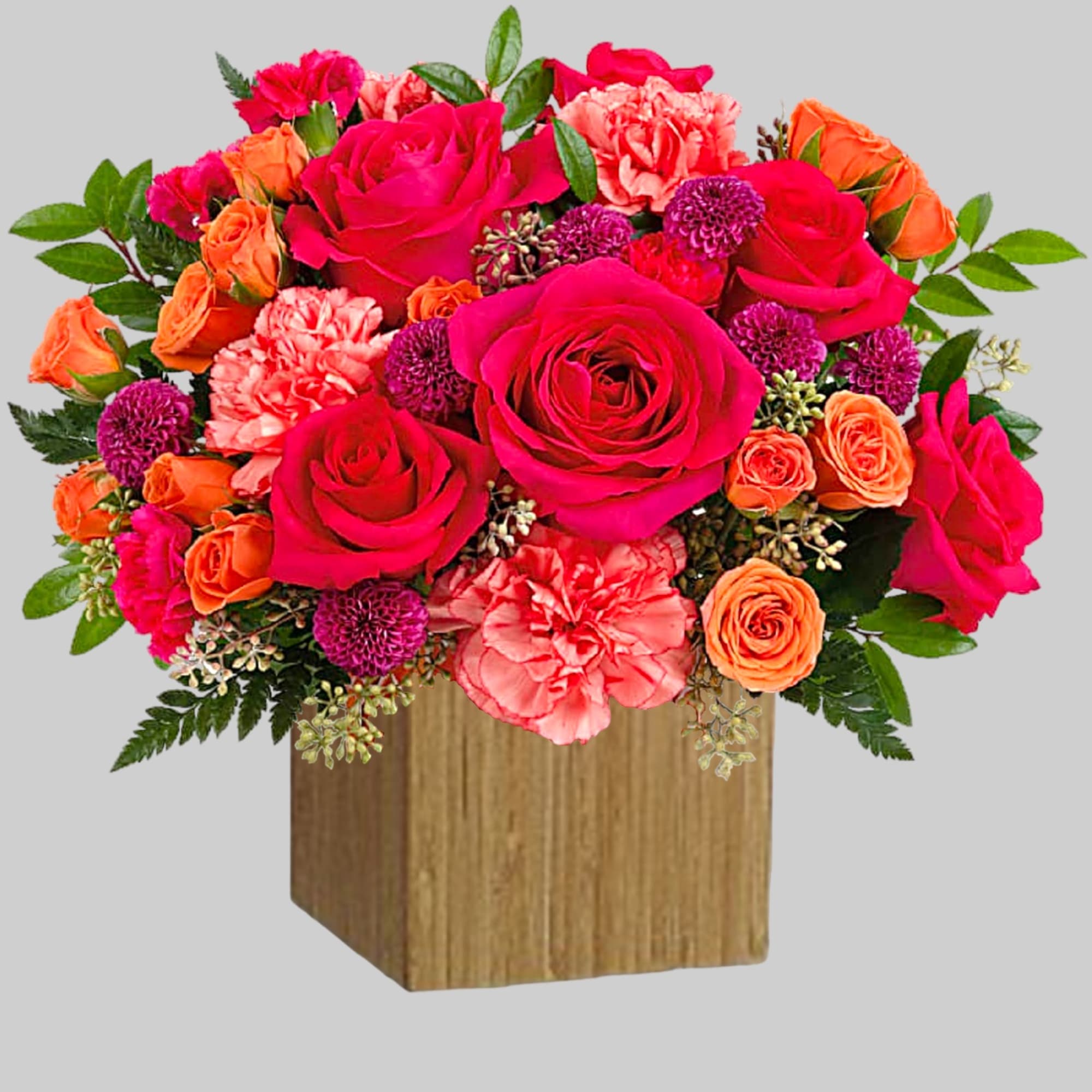 Bright pink and orange flower arrangement in a wooden box, photo 4 of 4