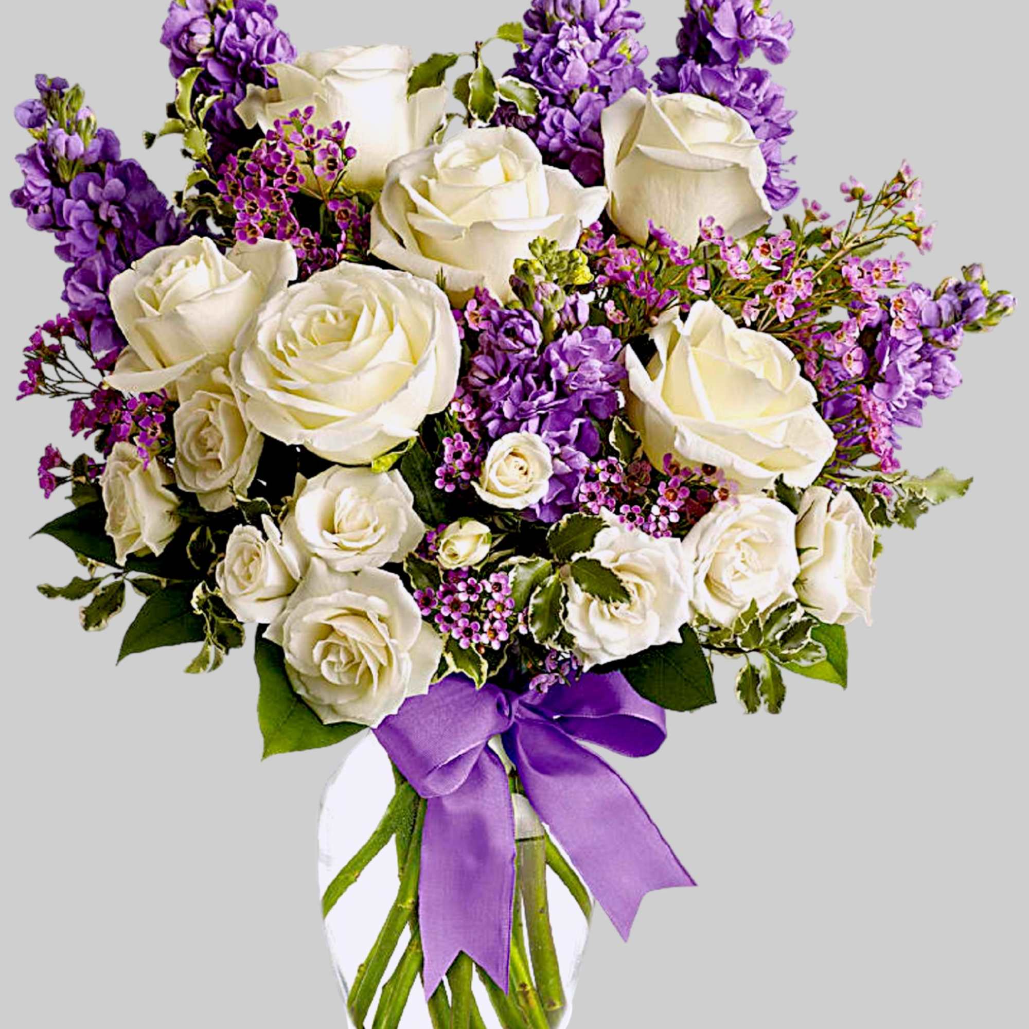 White roses and purple flowers in a glass vase with a purple ribbon, photo 4 of 5