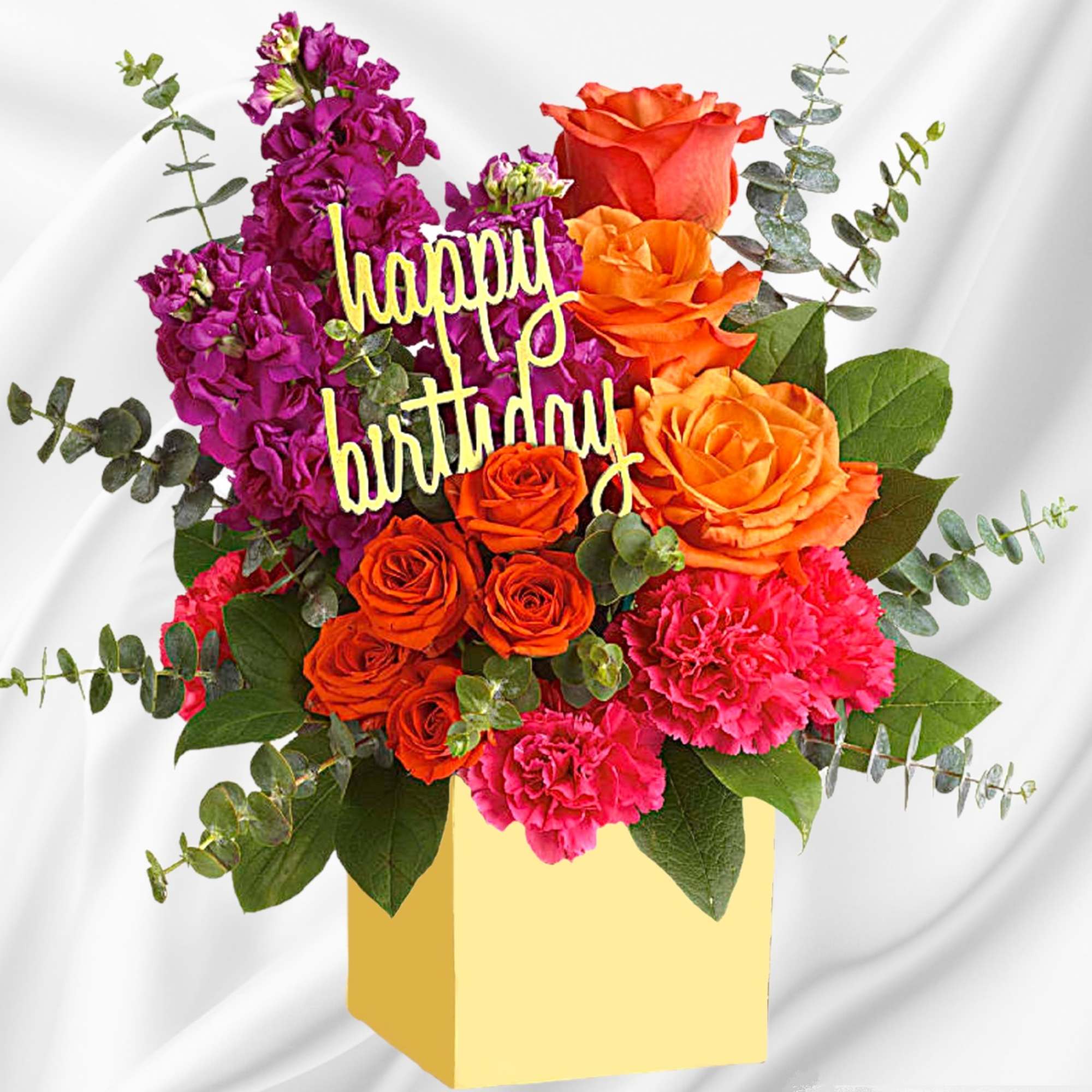 Bouquet of orange roses and pink carnations with a happy birthday sign