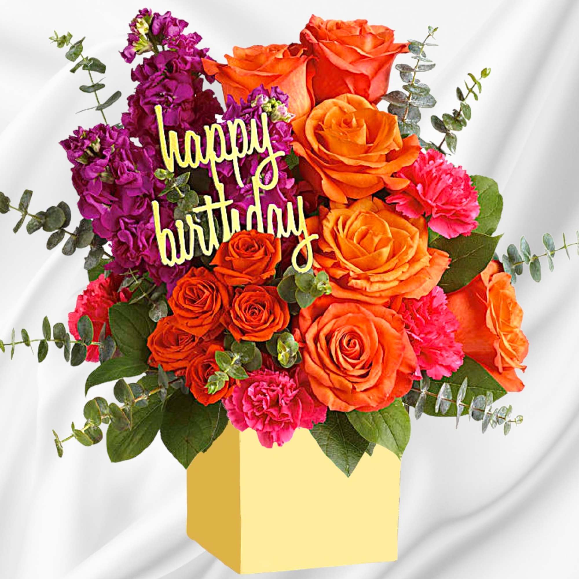 Bouquet of orange and purple flowers with a happy birthday sign in a yellow box