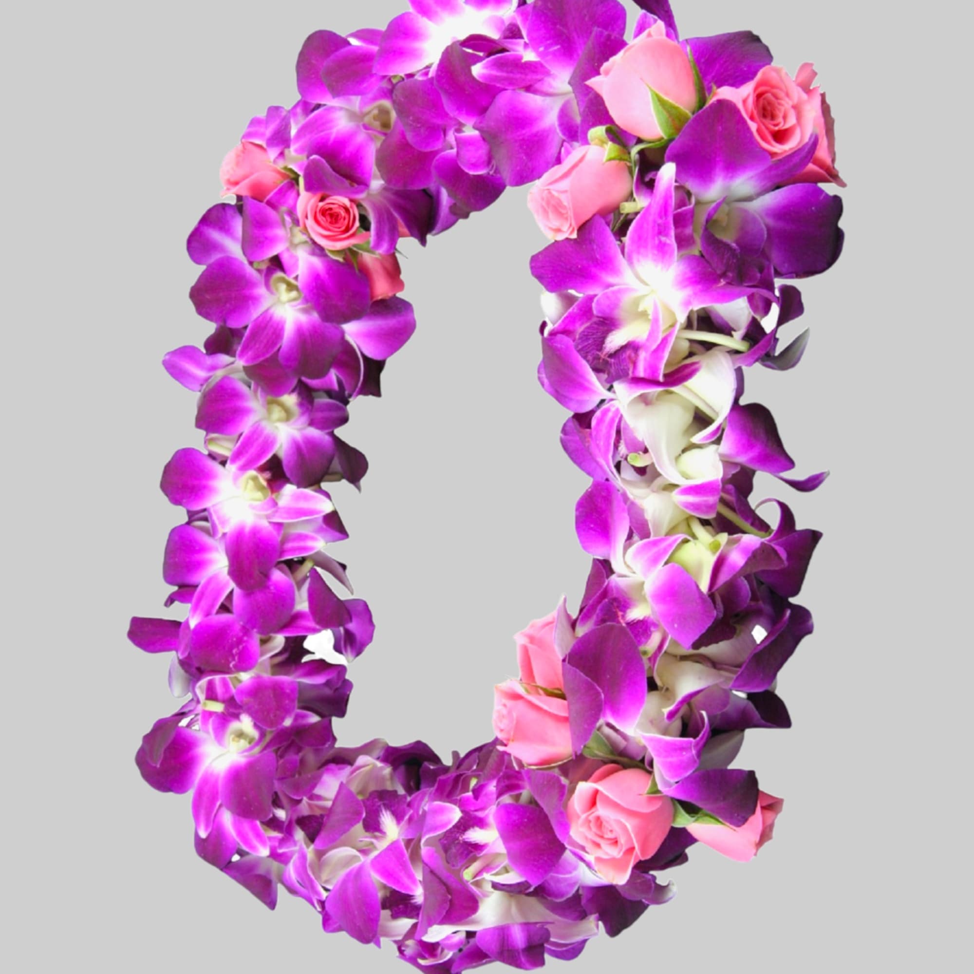 Purple orchid and pink rose floral wreath on a gray background