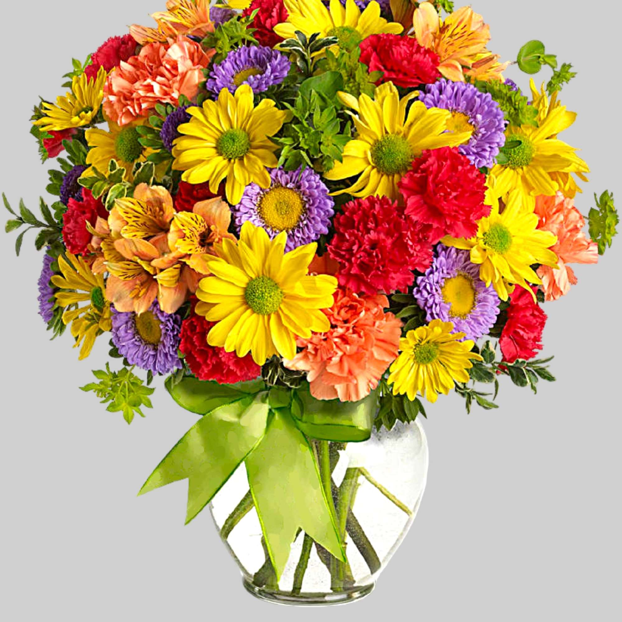 Colorful mixed bouquet in a clear glass vase with a green ribbon, photo 6 of 6