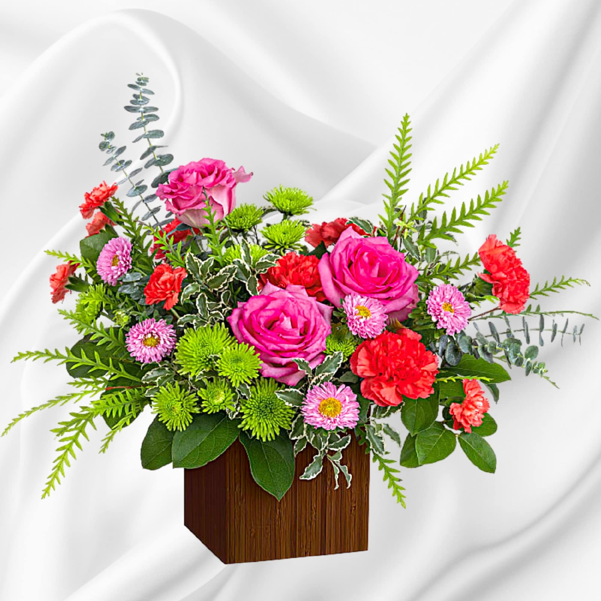Pink roses and red carnations in a wooden cube vase, photo 2 of 4