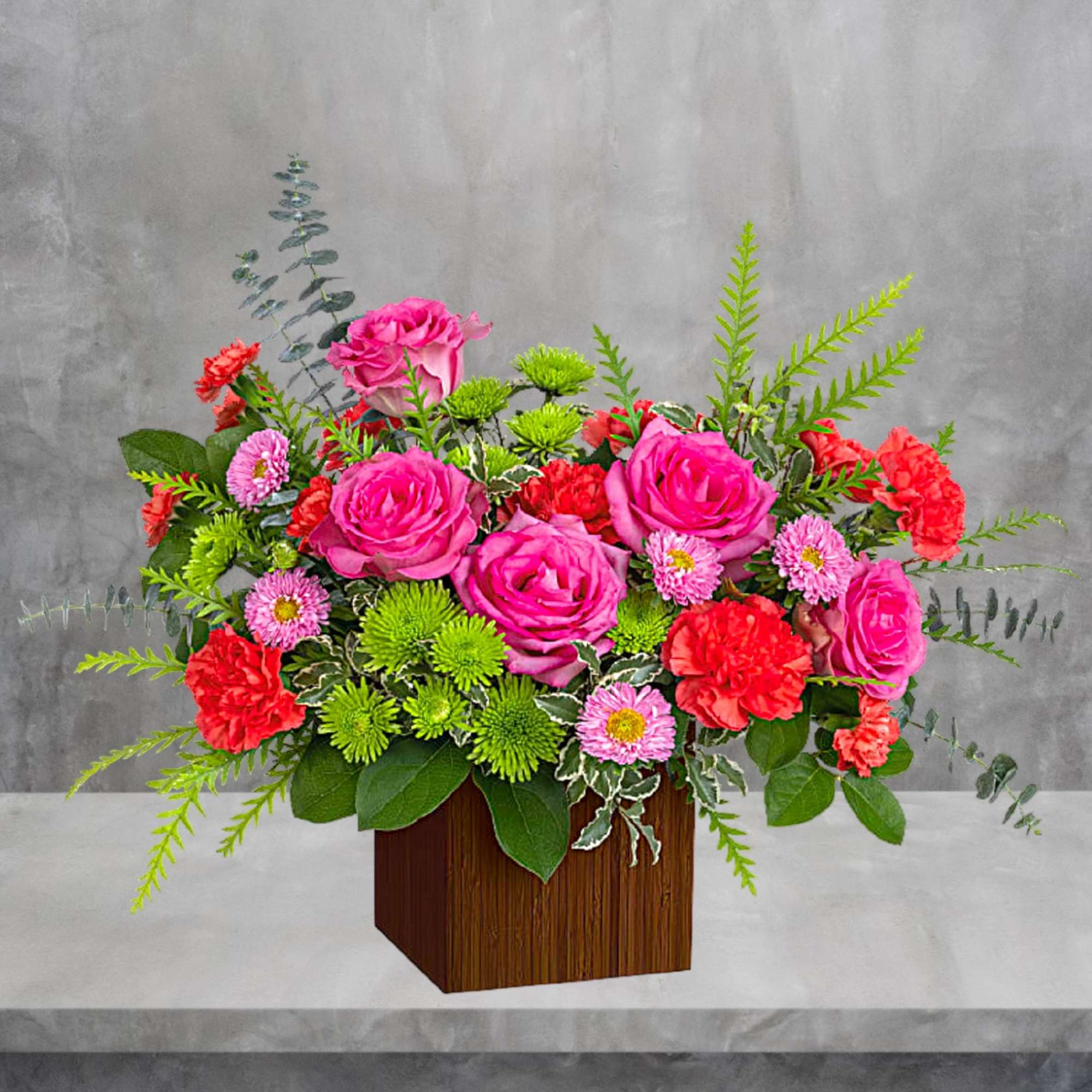 Pink roses and red carnations in a wooden cube vase, photo 3 of 4