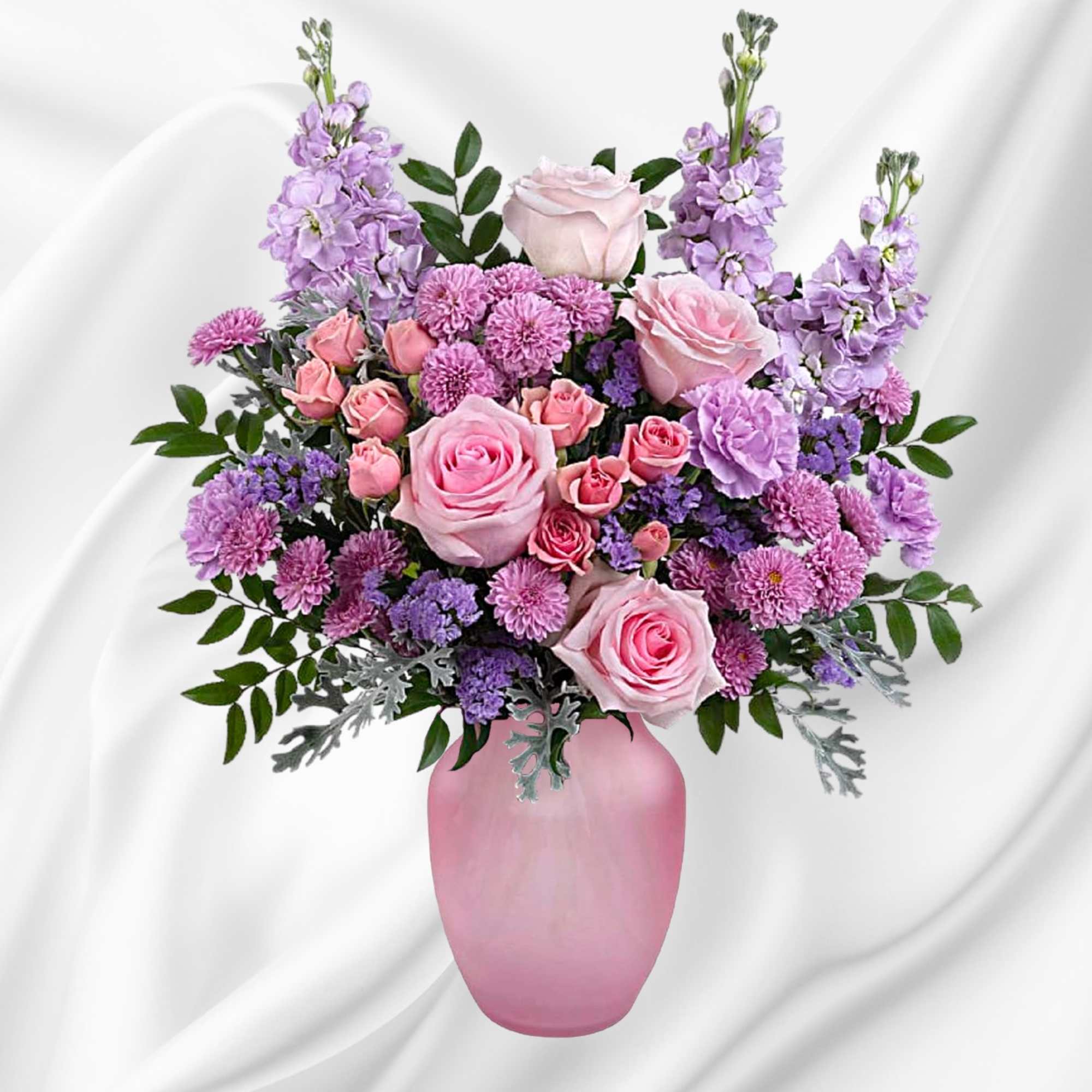 Pink and lavender flower arrangement in a pink vase, photo 4 of 4