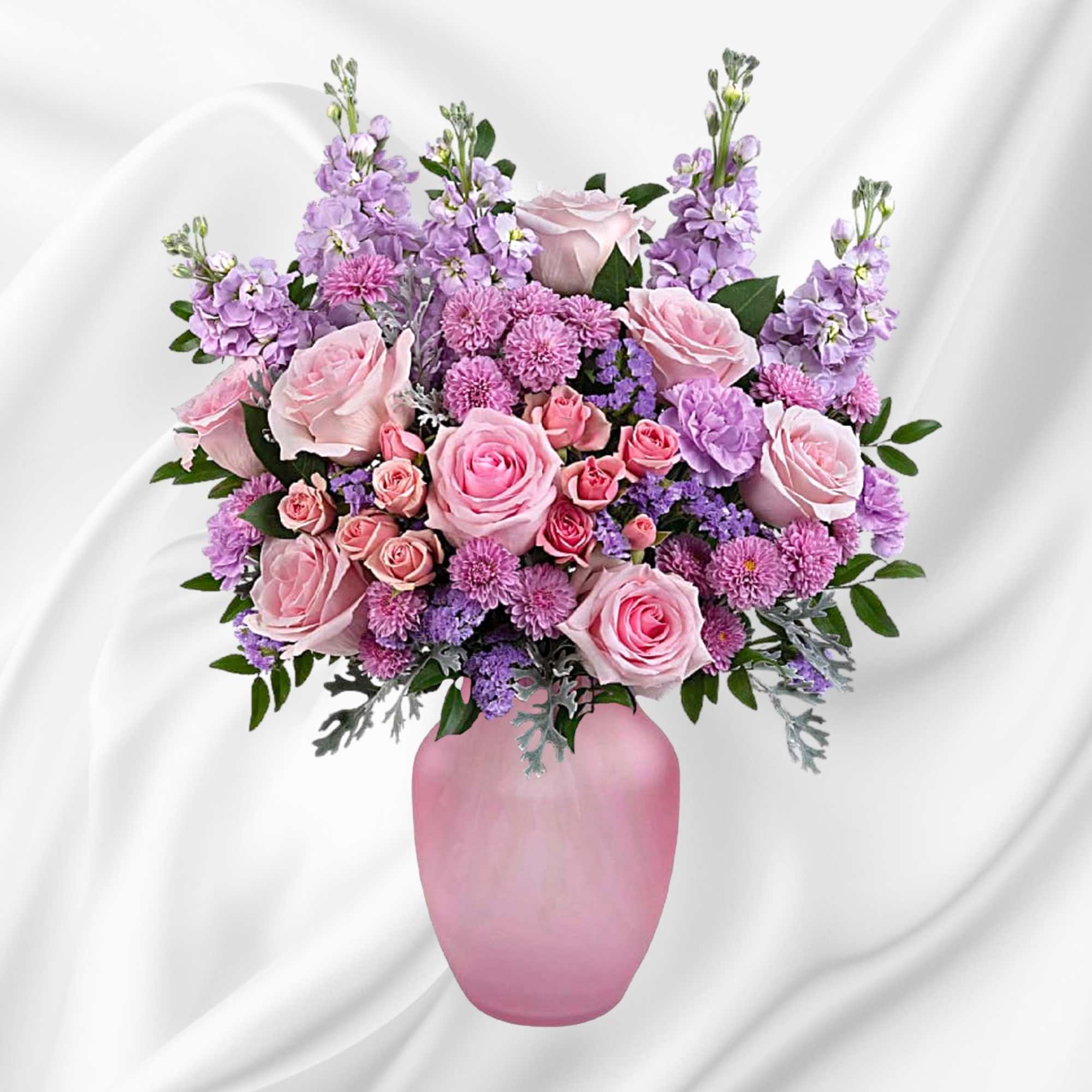 Pink and lavender flower arrangement in a pink vase, photo 4 of 4