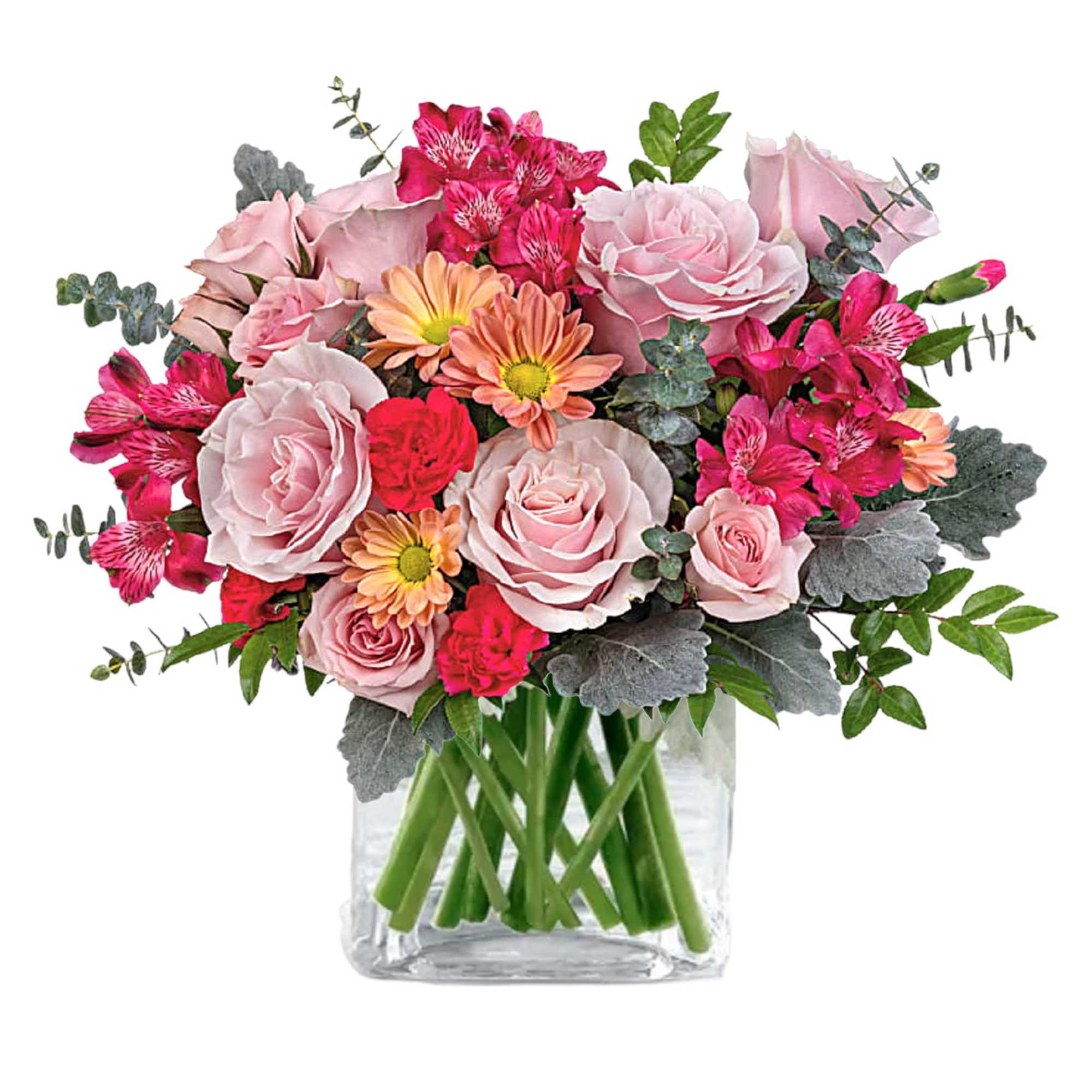 Pink roses and bright mixed flowers in a clear glass vase
