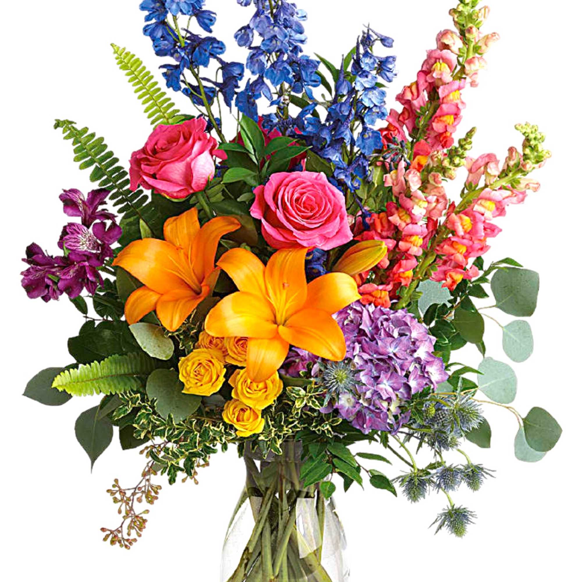 Colorful bouquet of roses, lilies, and snapdragons in a glass vase