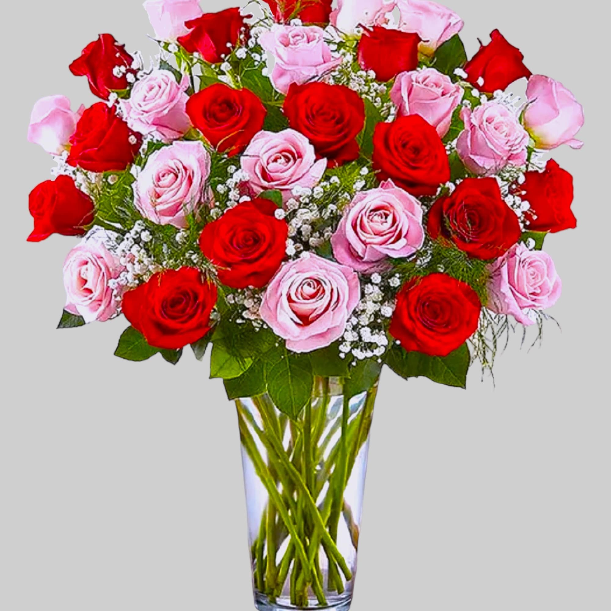 Bouquet of red and pink roses in a clear glass vase, photo 7 of 8