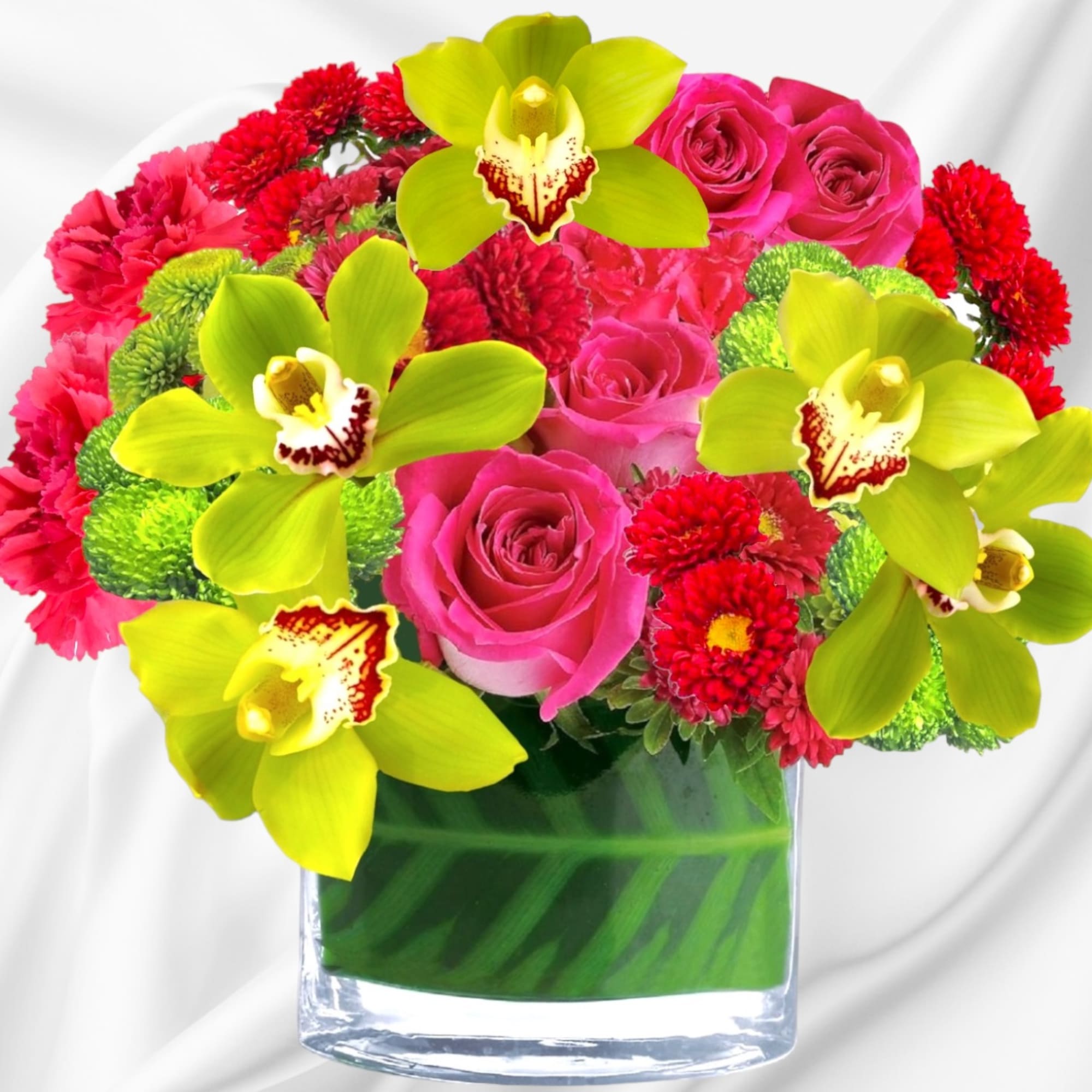 Pink roses and red flowers in a glass vase with lime orchids, photo 2 of 4