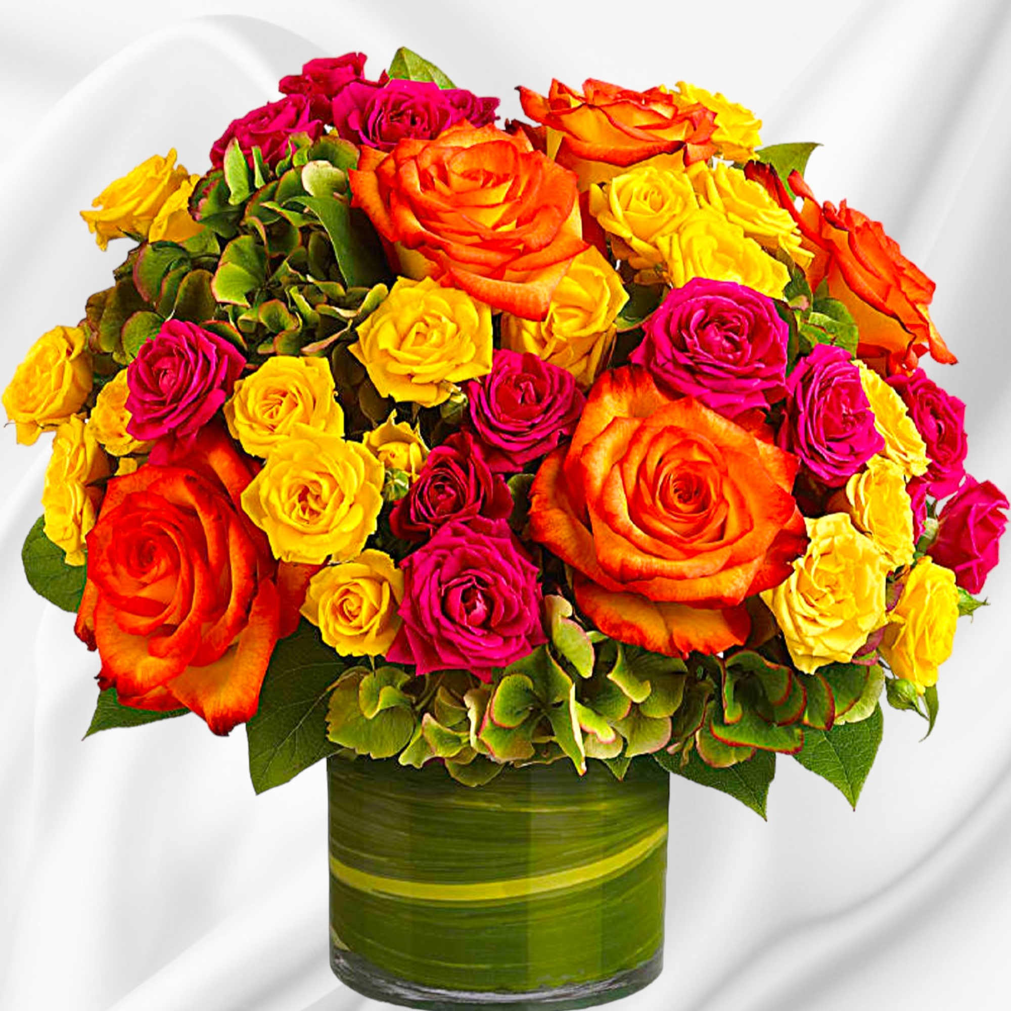 Bouquet of orange, yellow, and pink roses in a green glass vase, photo 2 of 4