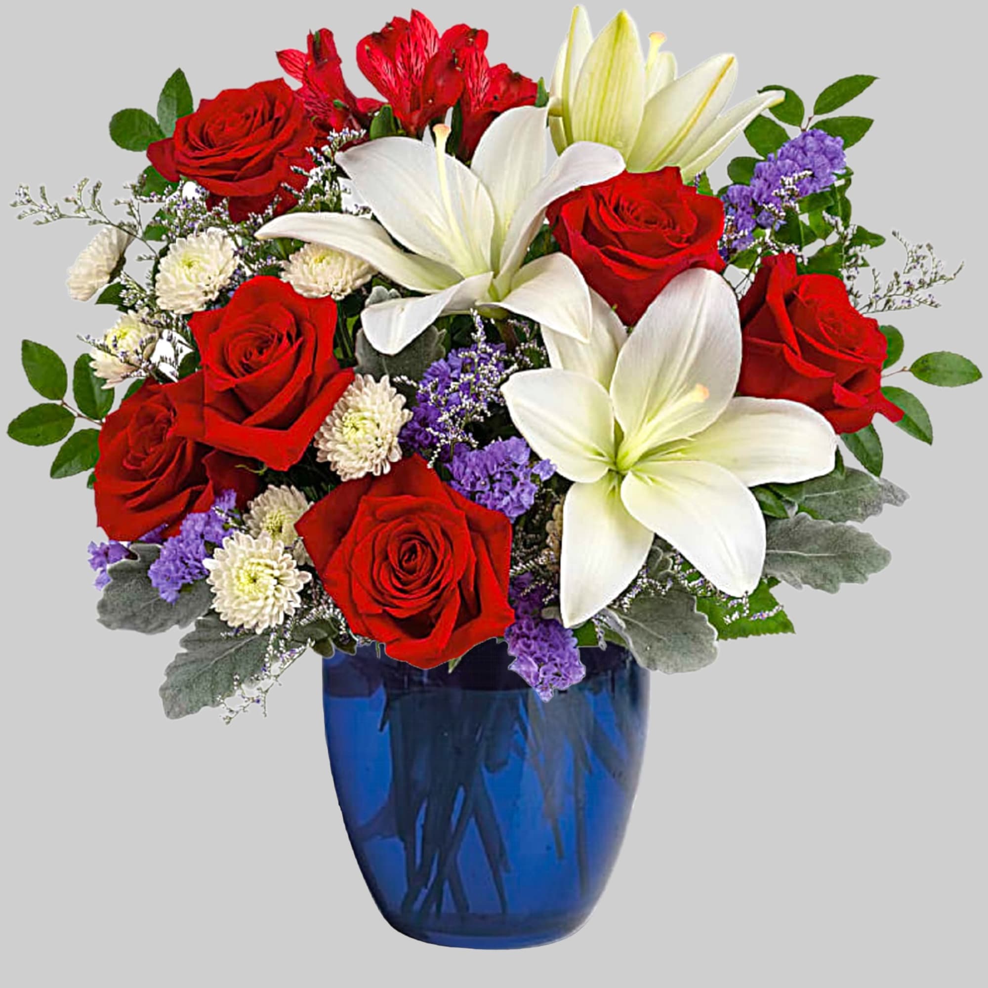 Red roses and white lilies arranged in a blue vase, photo 4 of 4