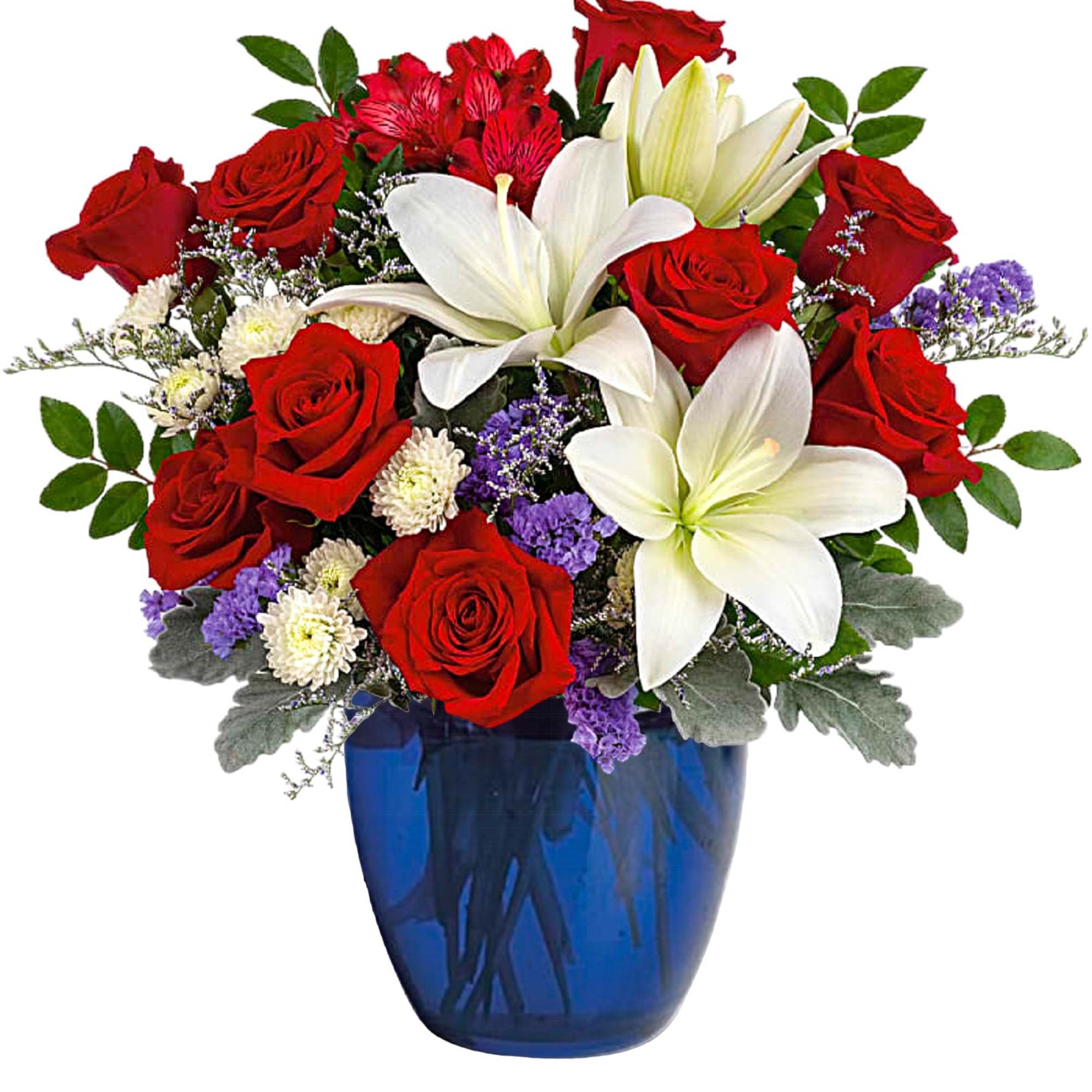 Red roses and white lilies arranged in a blue vase