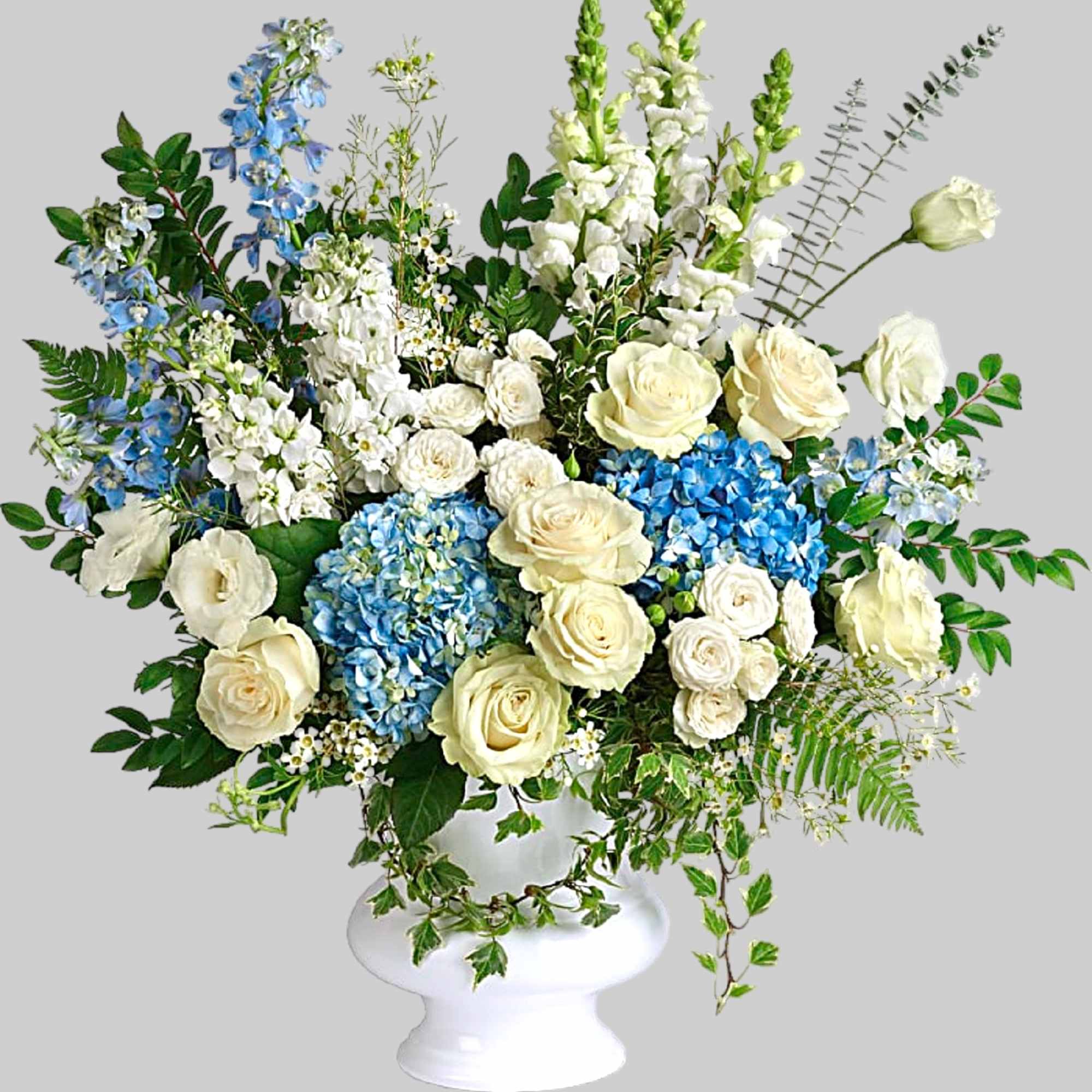 White and blue floral arrangement in a white pedestal vase, photo 4 of 4