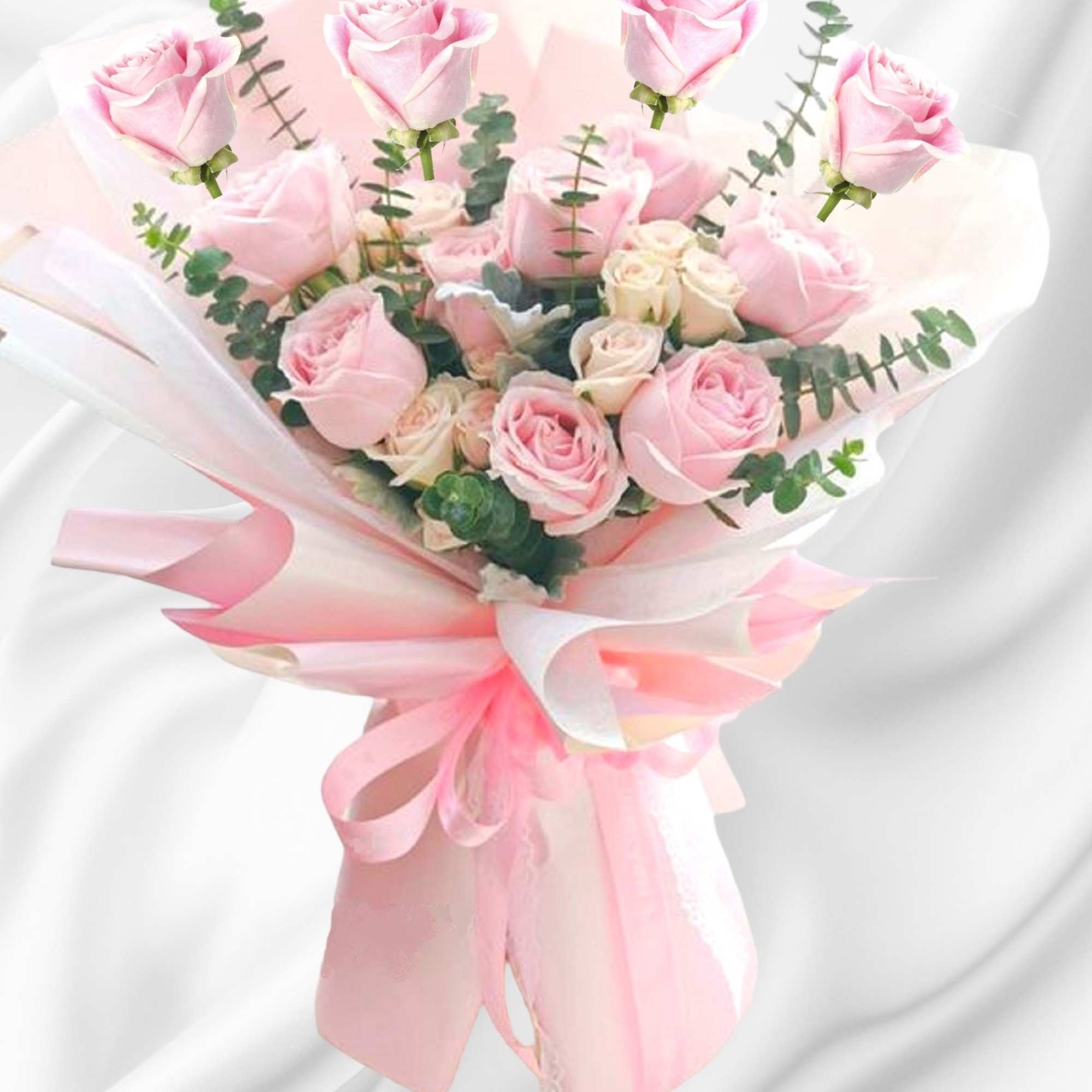 Bouquet of pale pink roses wrapped in pink and white paper, photo 2 of 5