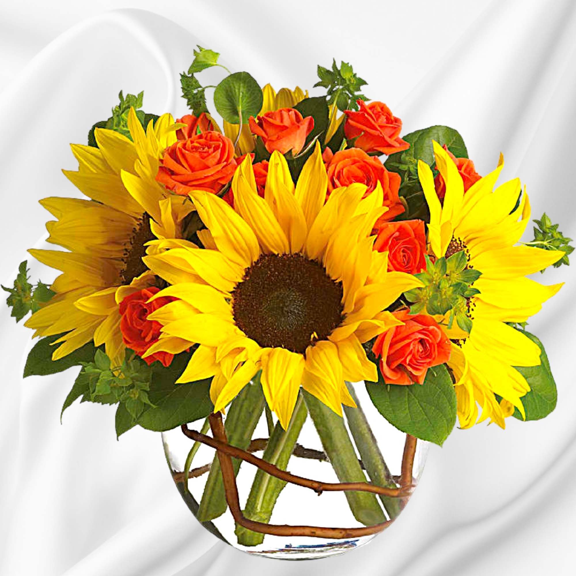 Sunflowers and orange roses arranged in a clear glass vase, photo 5 of 6