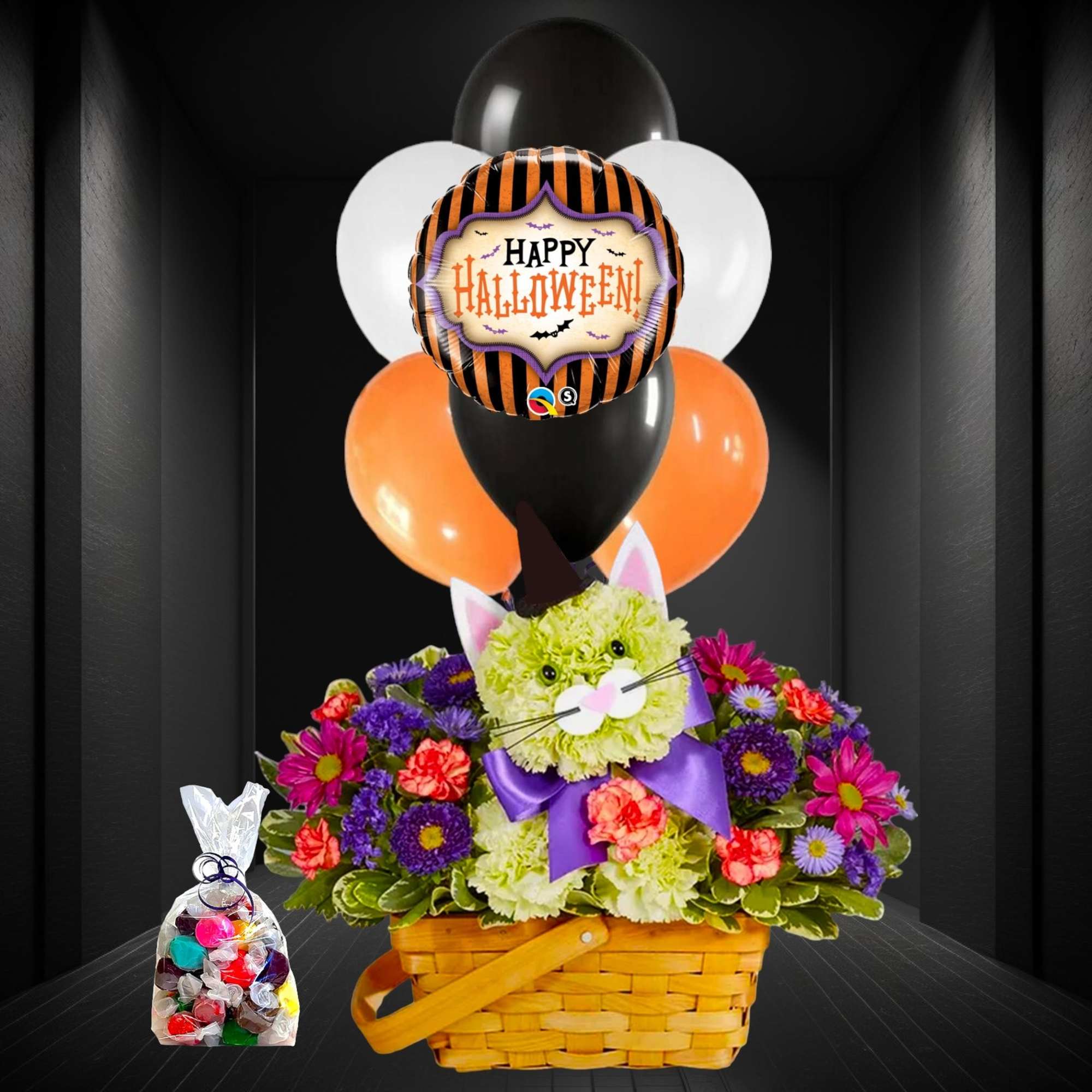 Halloween balloon bouquet with a flower basket and candy bag