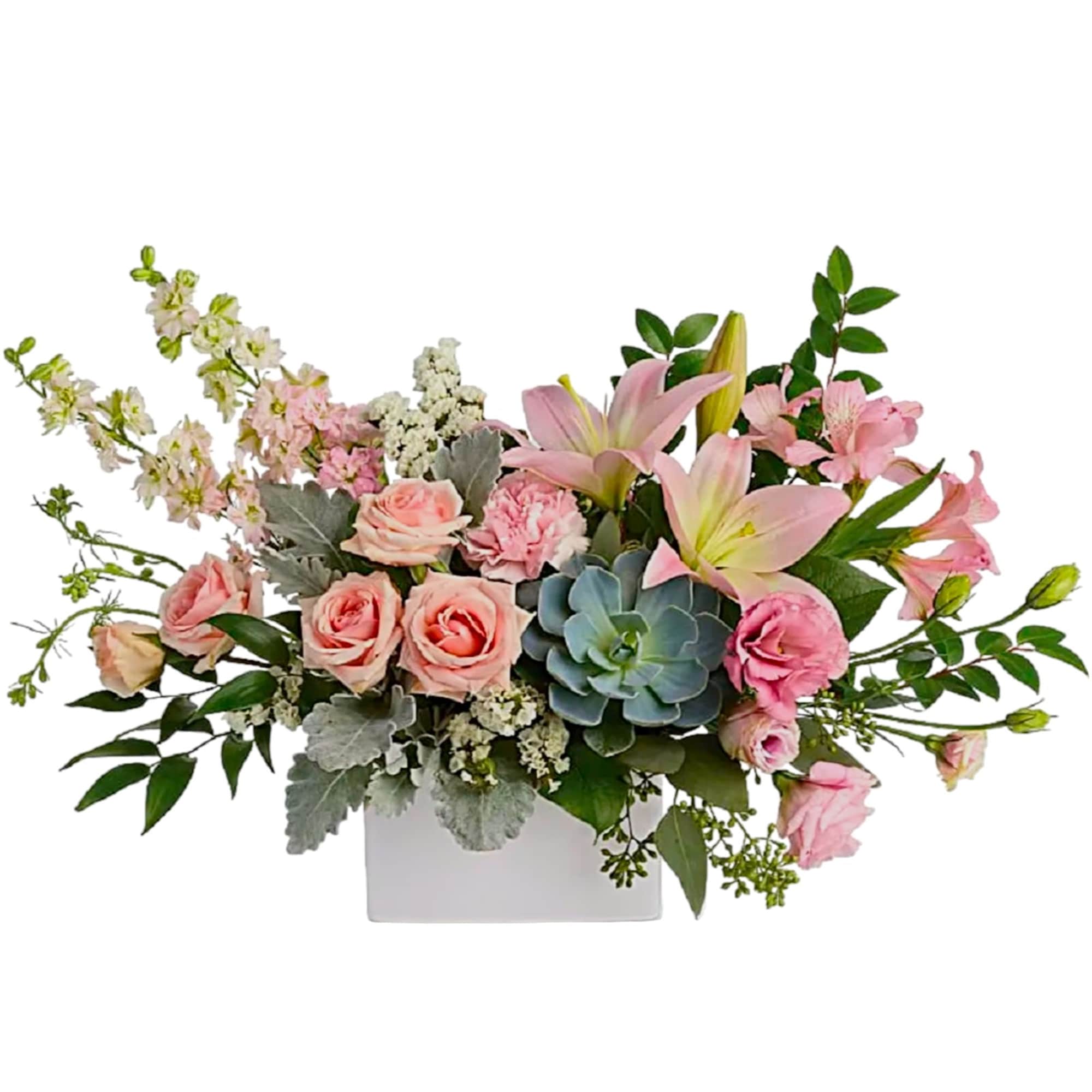 Pink roses and lilies arranged in a white rectangular vase