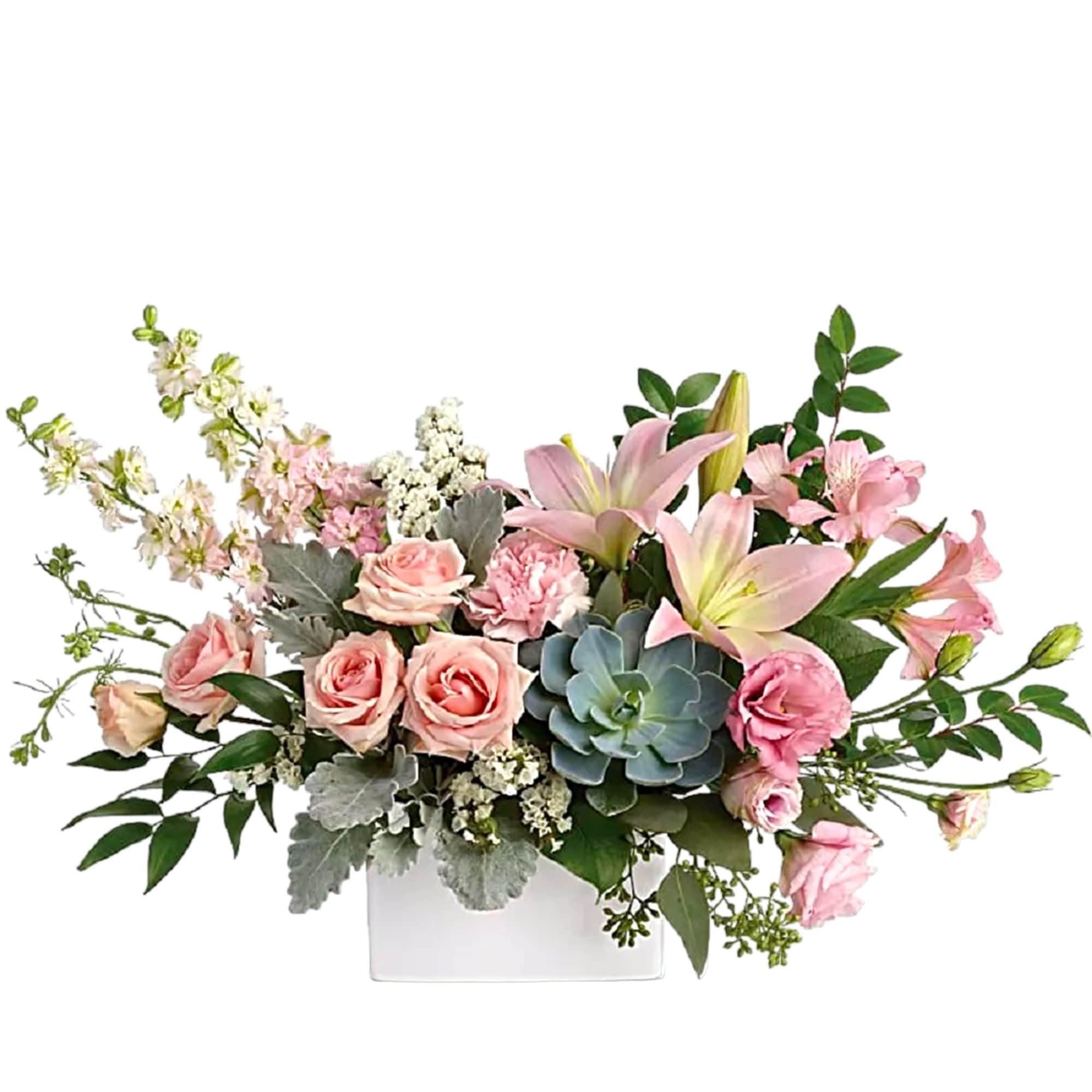 Pink roses and lilies in a white rectangular vase