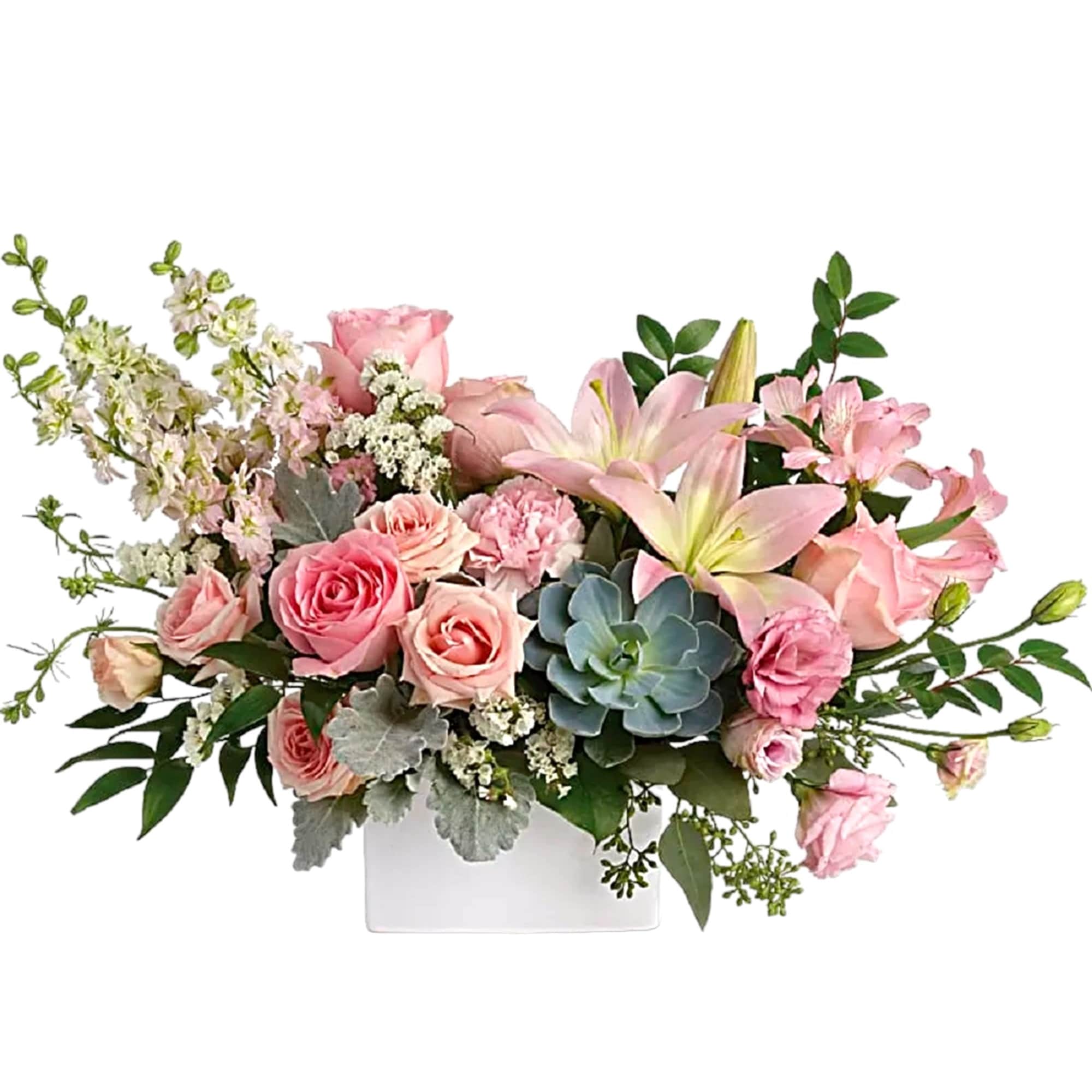 Pink roses and lilies arranged in a white rectangular vase