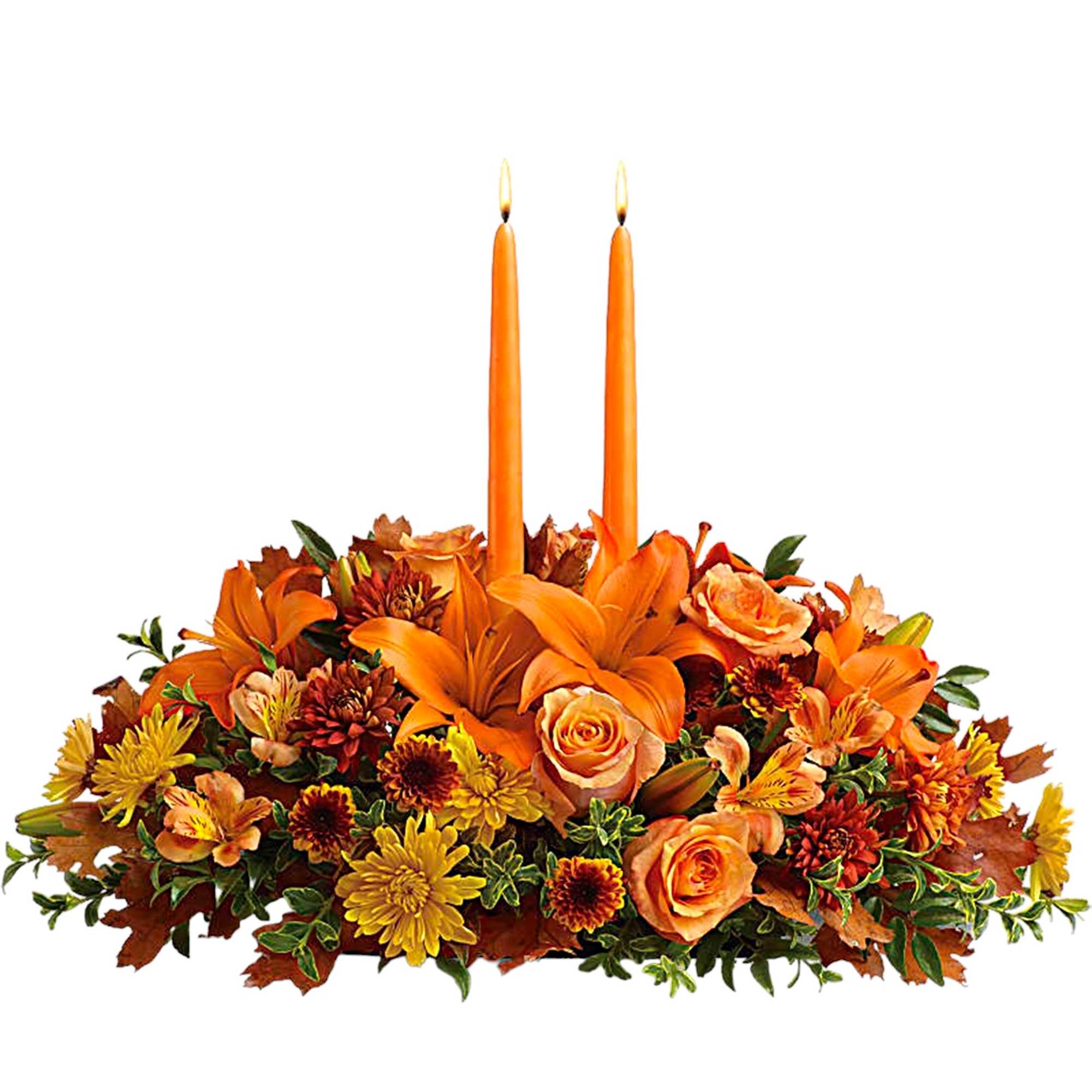 Orange floral centerpiece with two lit taper candles