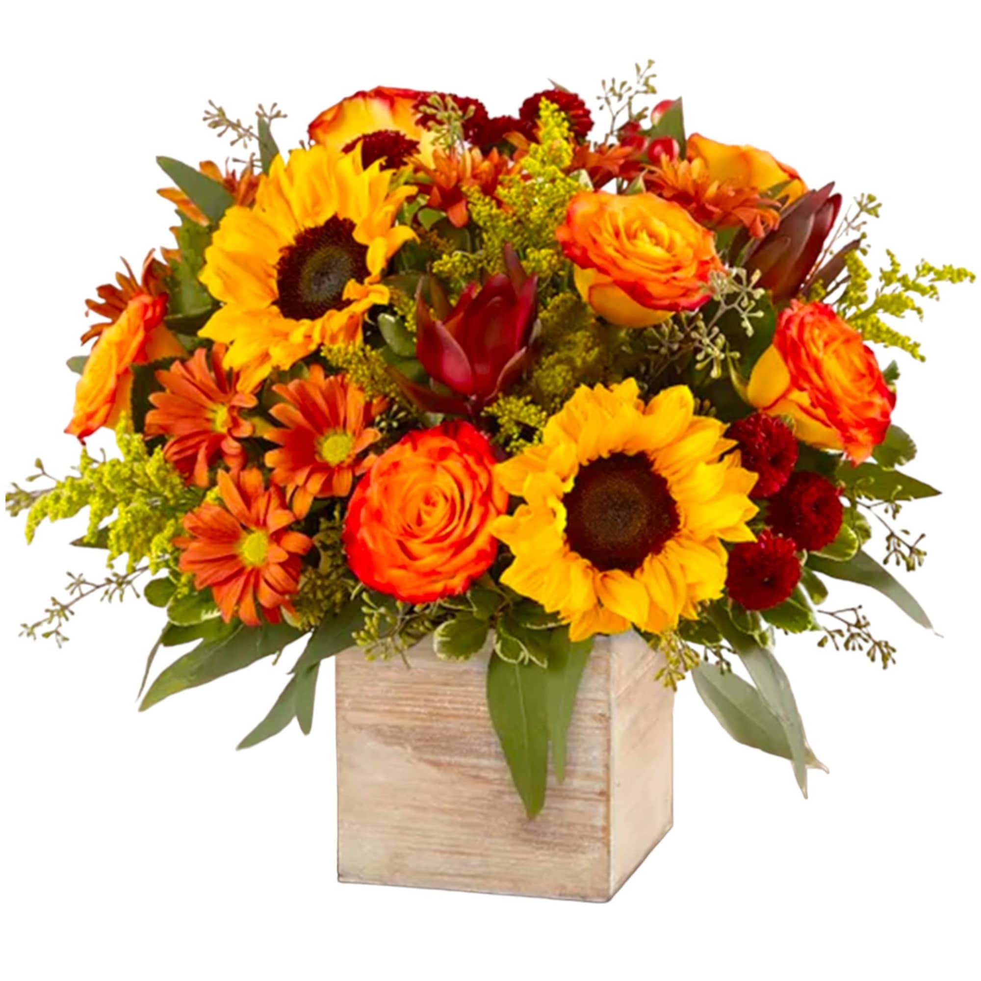 Orange and yellow floral arrangement in a wooden cube vase