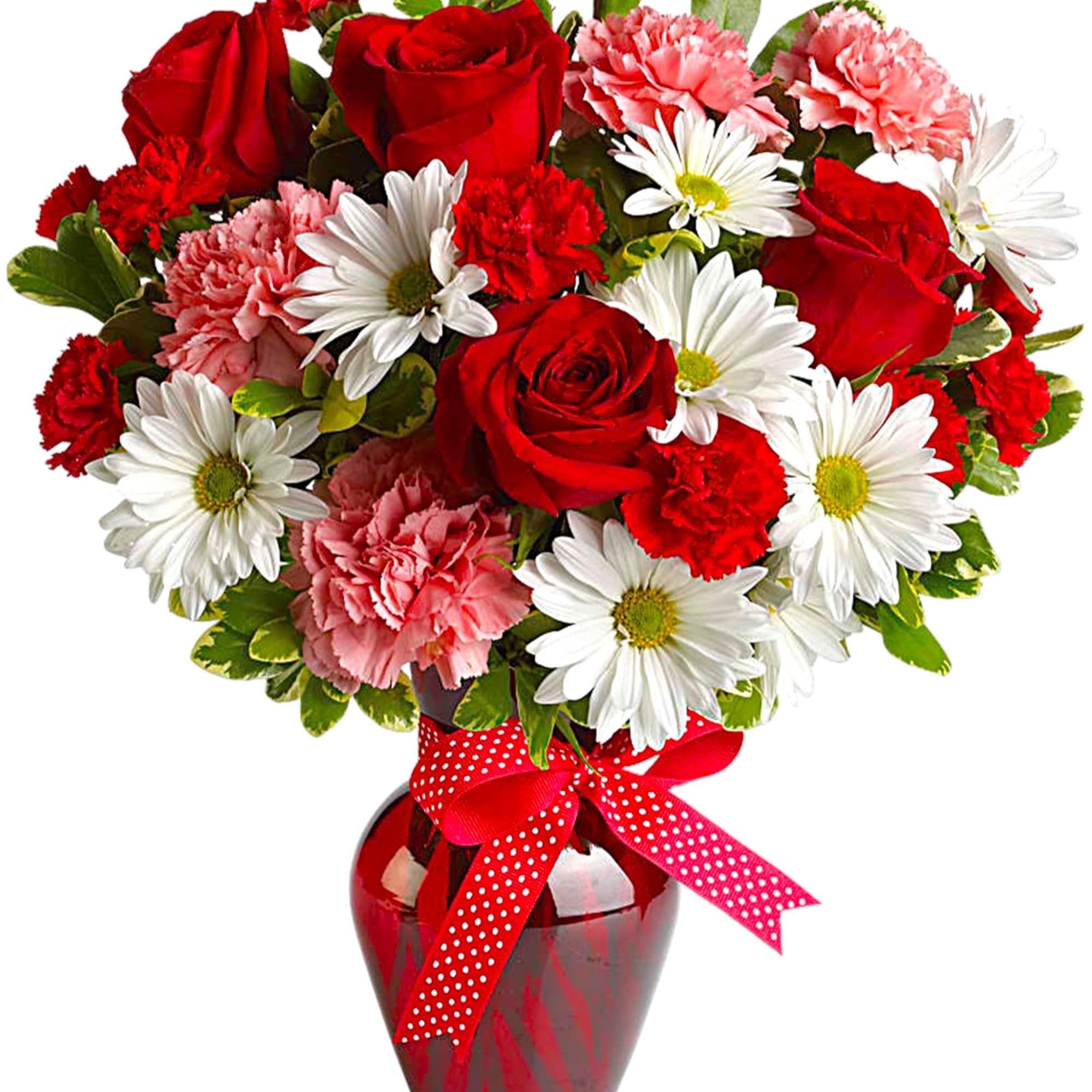 Red roses, pink carnations, and white daisies in a red vase with a ribbon