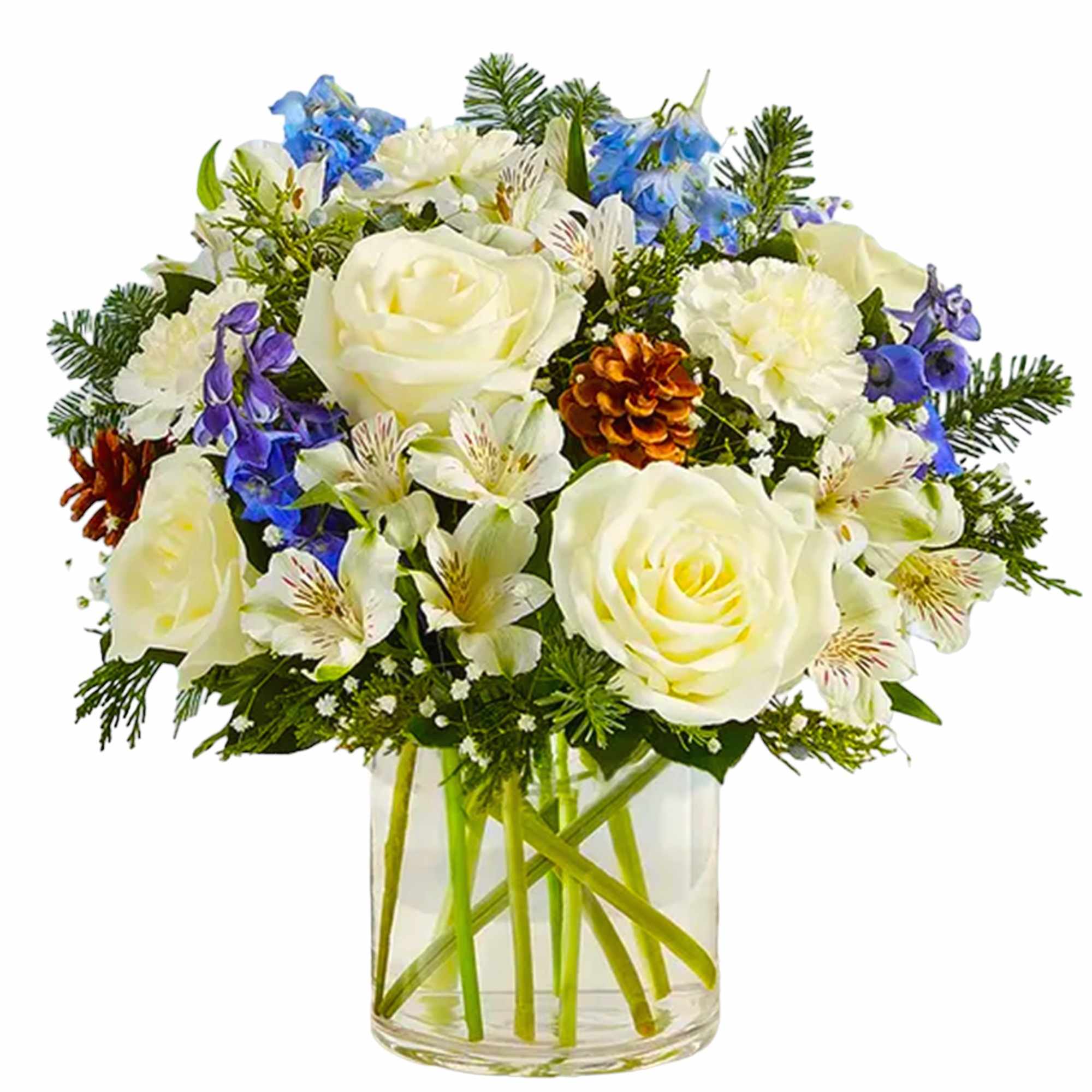 White roses and mixed blue flowers in a clear glass vase