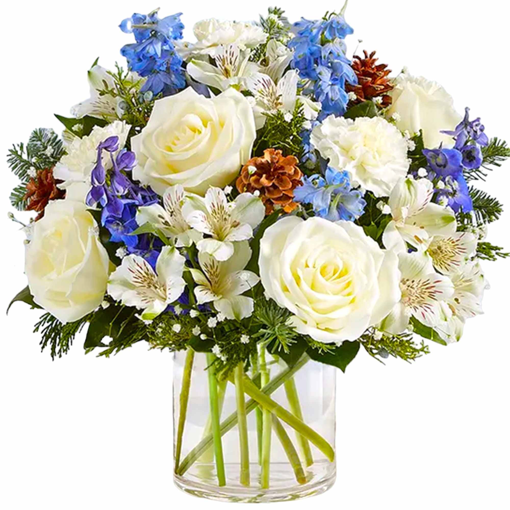 White roses and blue flowers in a clear glass vase