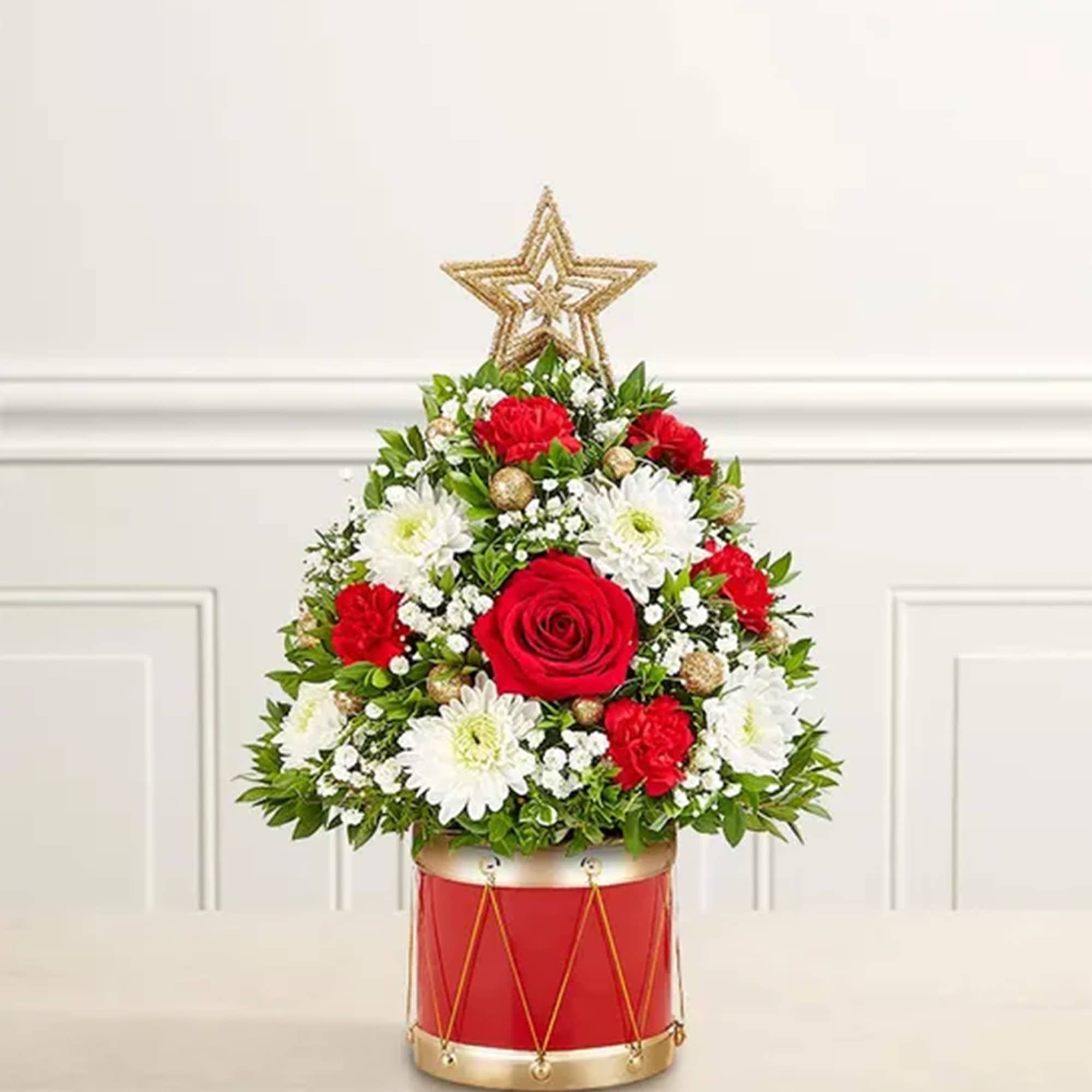 Red and white floral arrangement in a red drum container with a star topper, photo 3 of 5