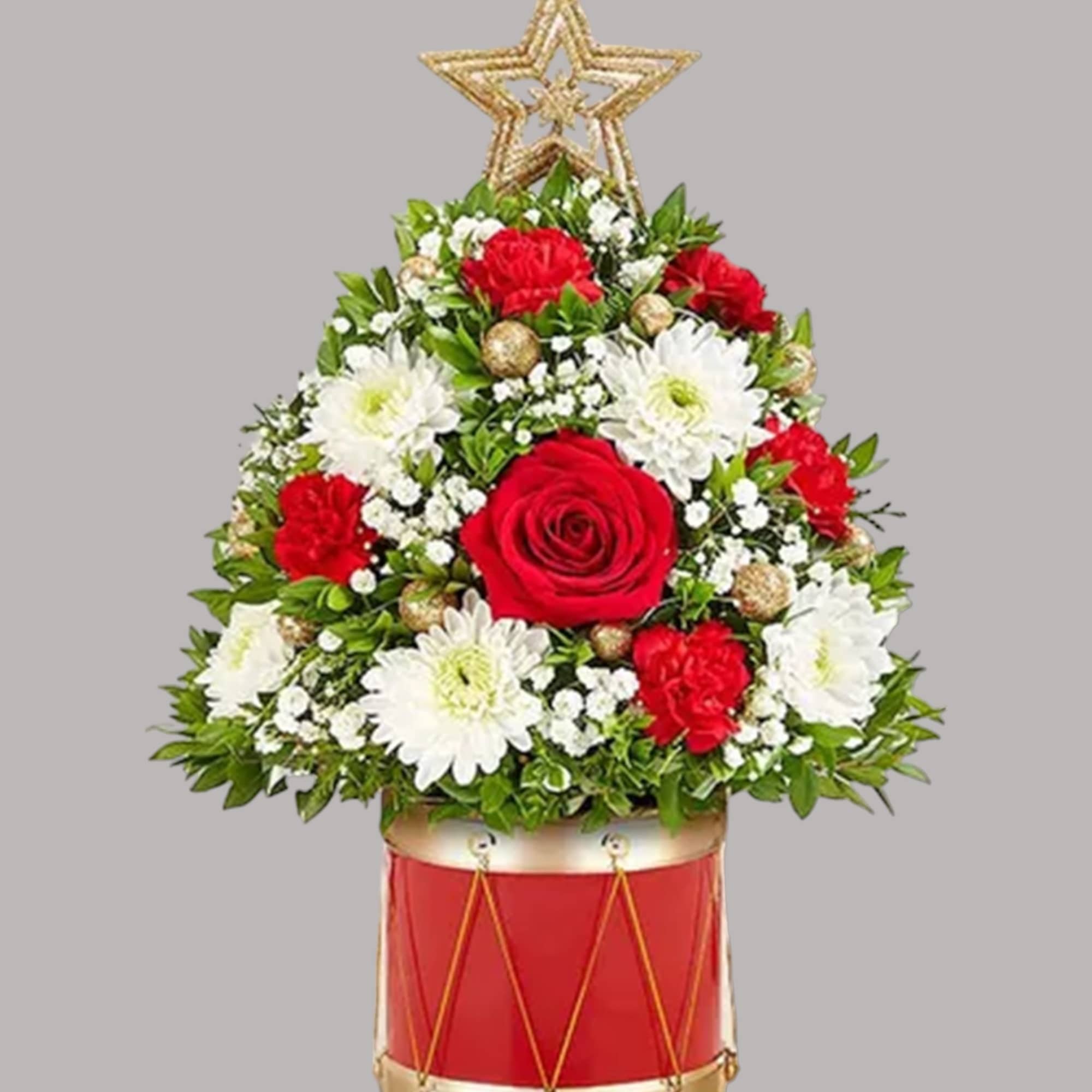 Red and white floral arrangement in a red drum-shaped container with a star topper, photo 4 of 5