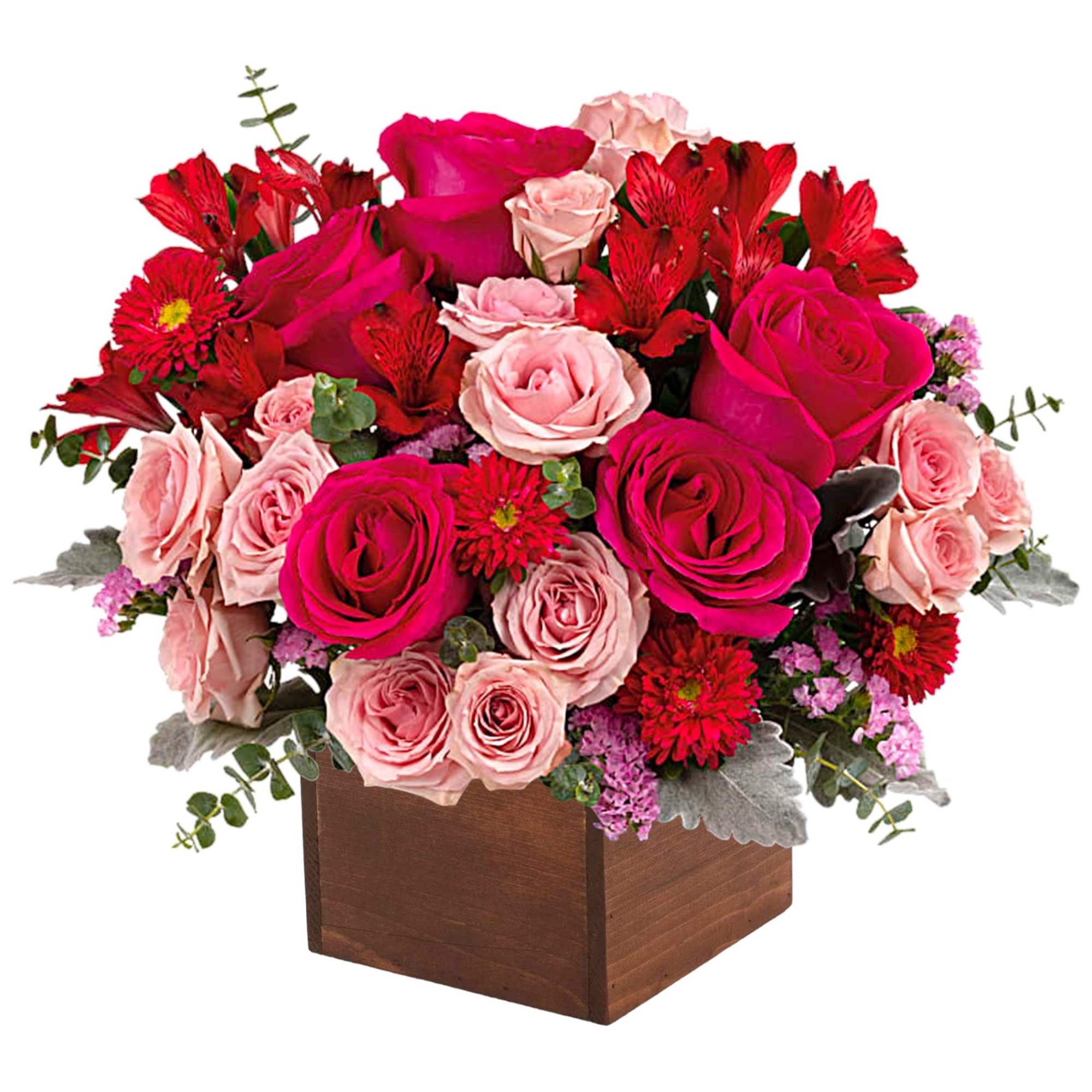 Pink and red rose arrangement in a wooden box