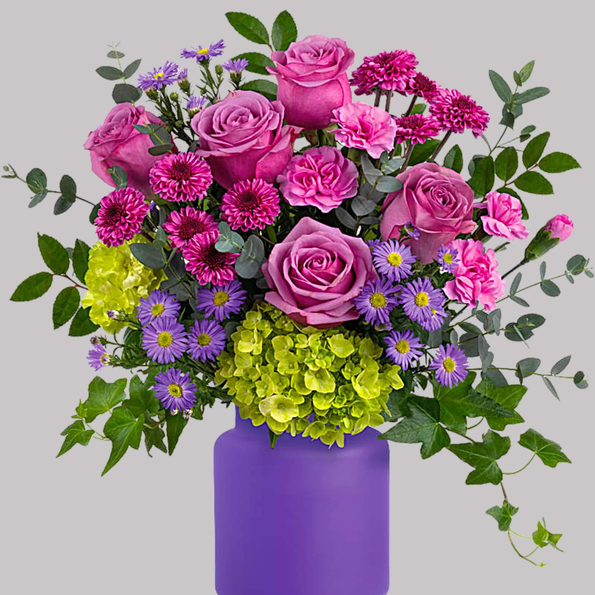 Pink roses and purple flowers in a purple vase, photo 2 of 3