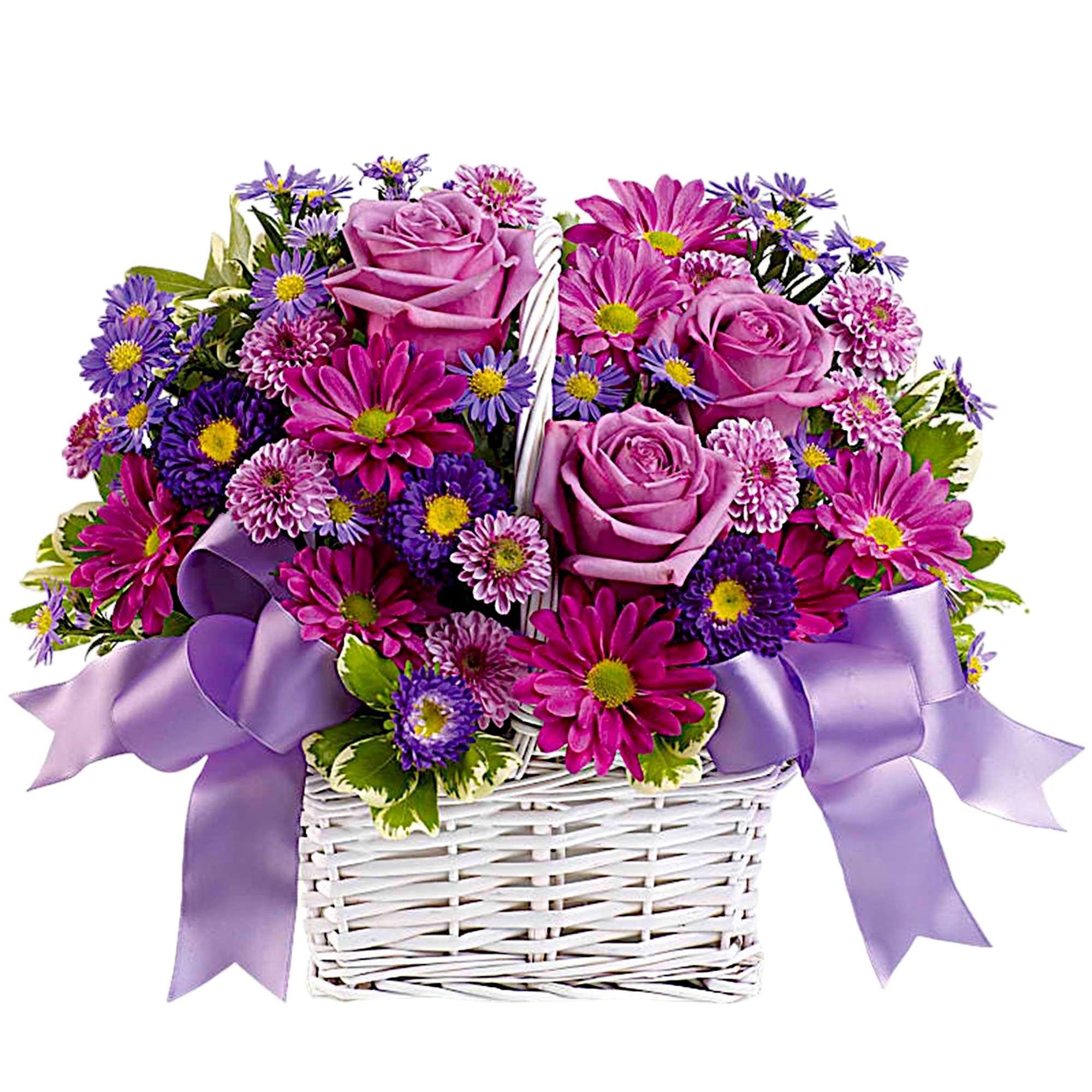 Pink roses and purple daisies in a white basket with lavender ribbon