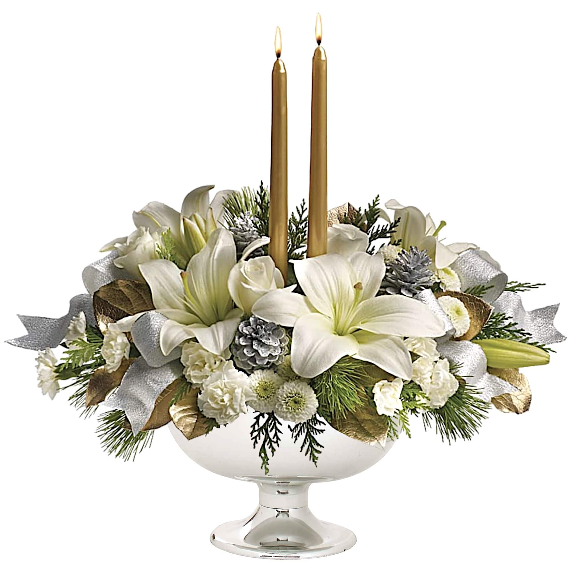 White lilies and candles in a glass bowl centerpiece